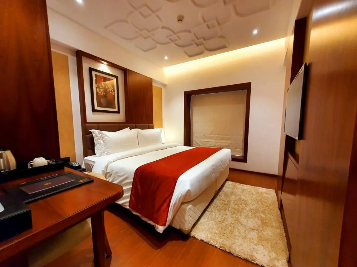 Bed in Hotel MBC Citadel Nashik