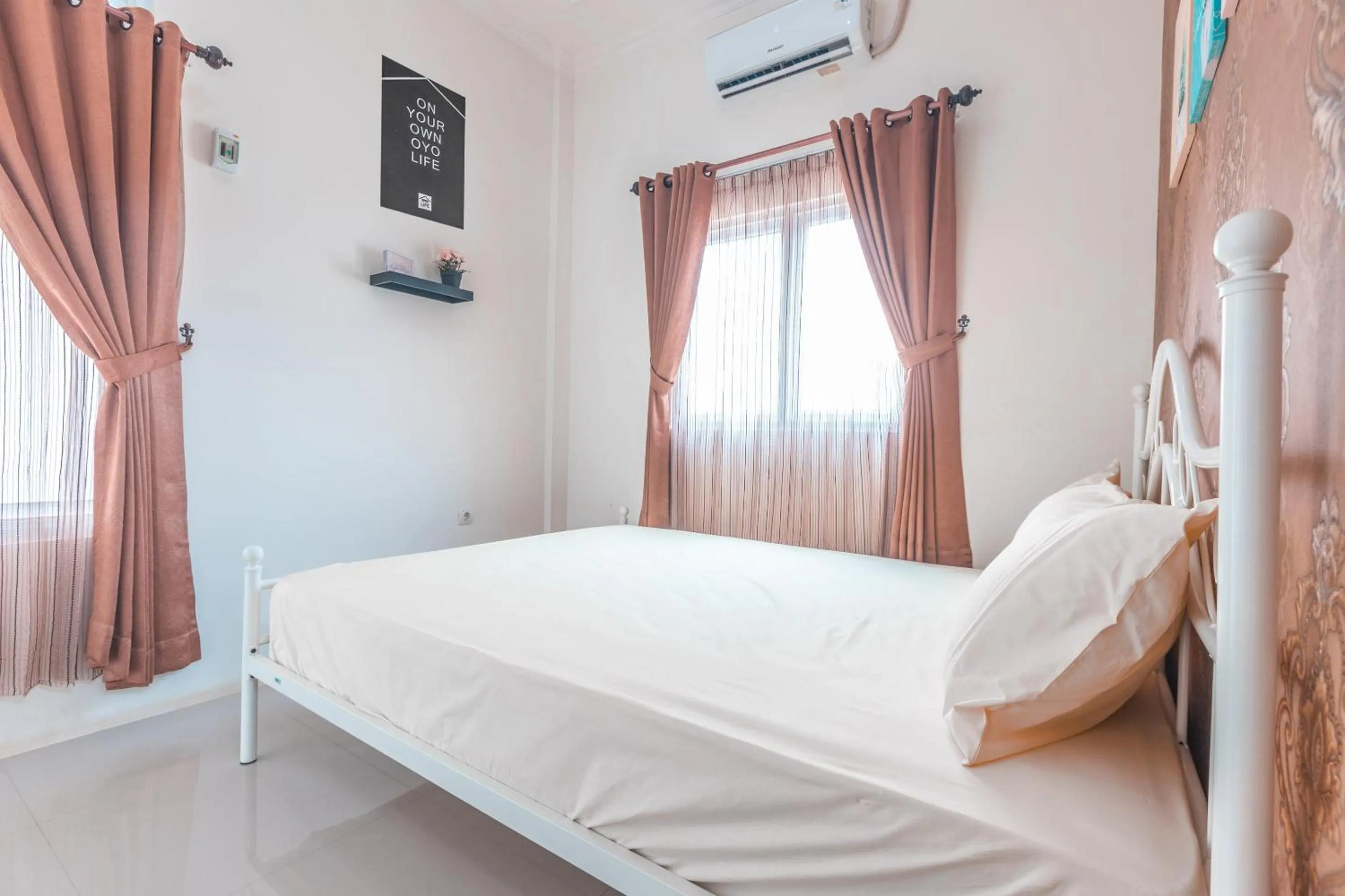 Bedroom, Bed in OYO Life 2658 Kost Rasyamada