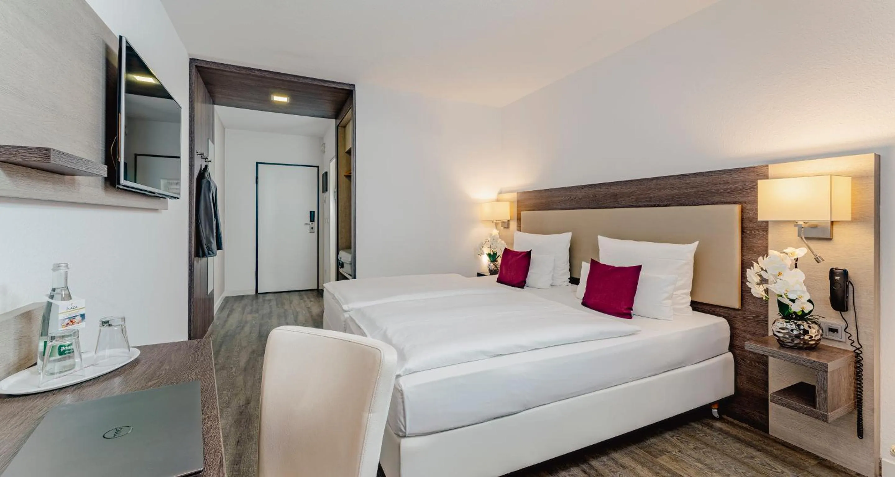 Photo of the whole room, Bed in PLAZA INN Karlsruhe Nord