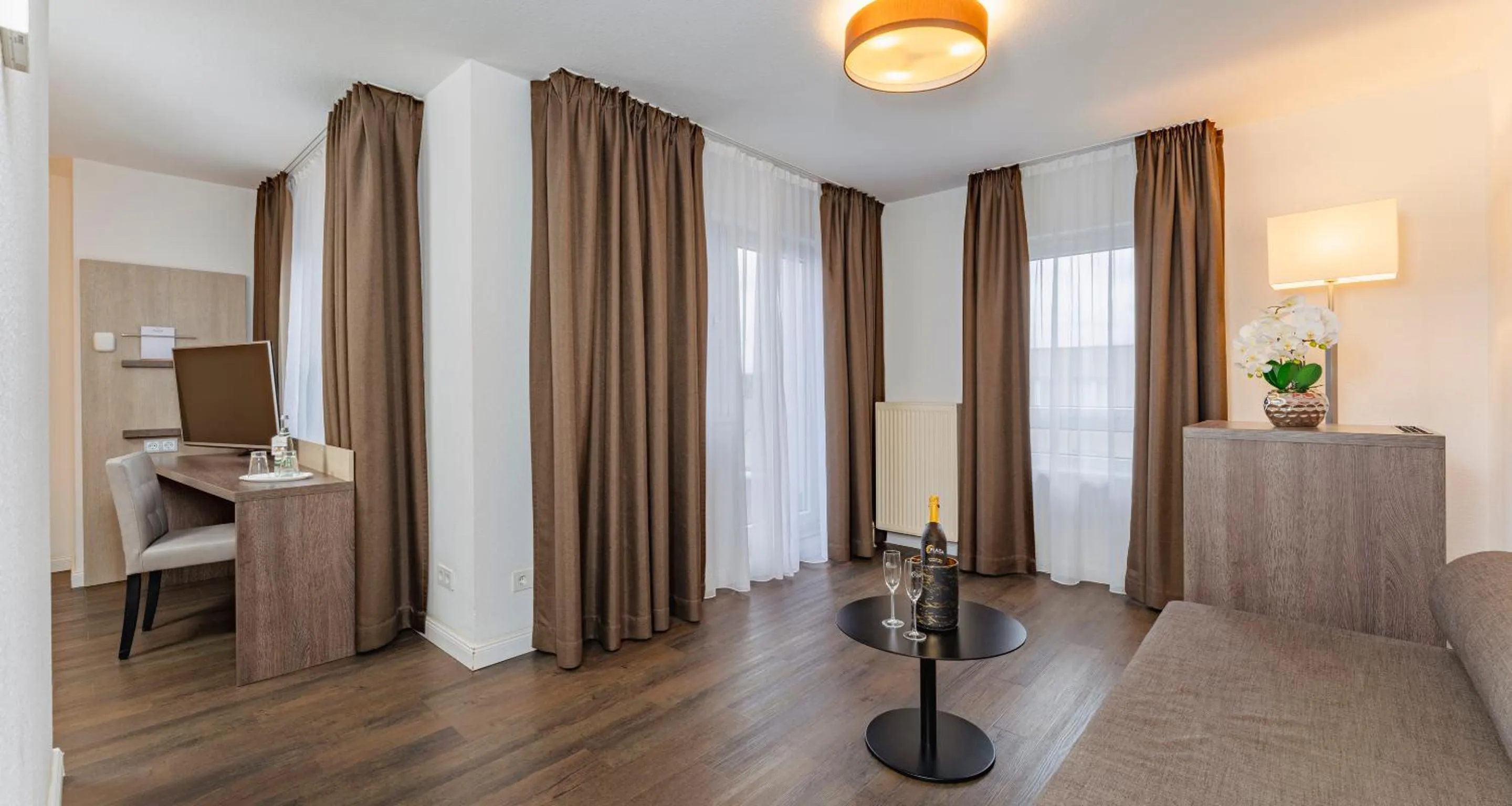 Living room in PLAZA INN Karlsruhe Nord