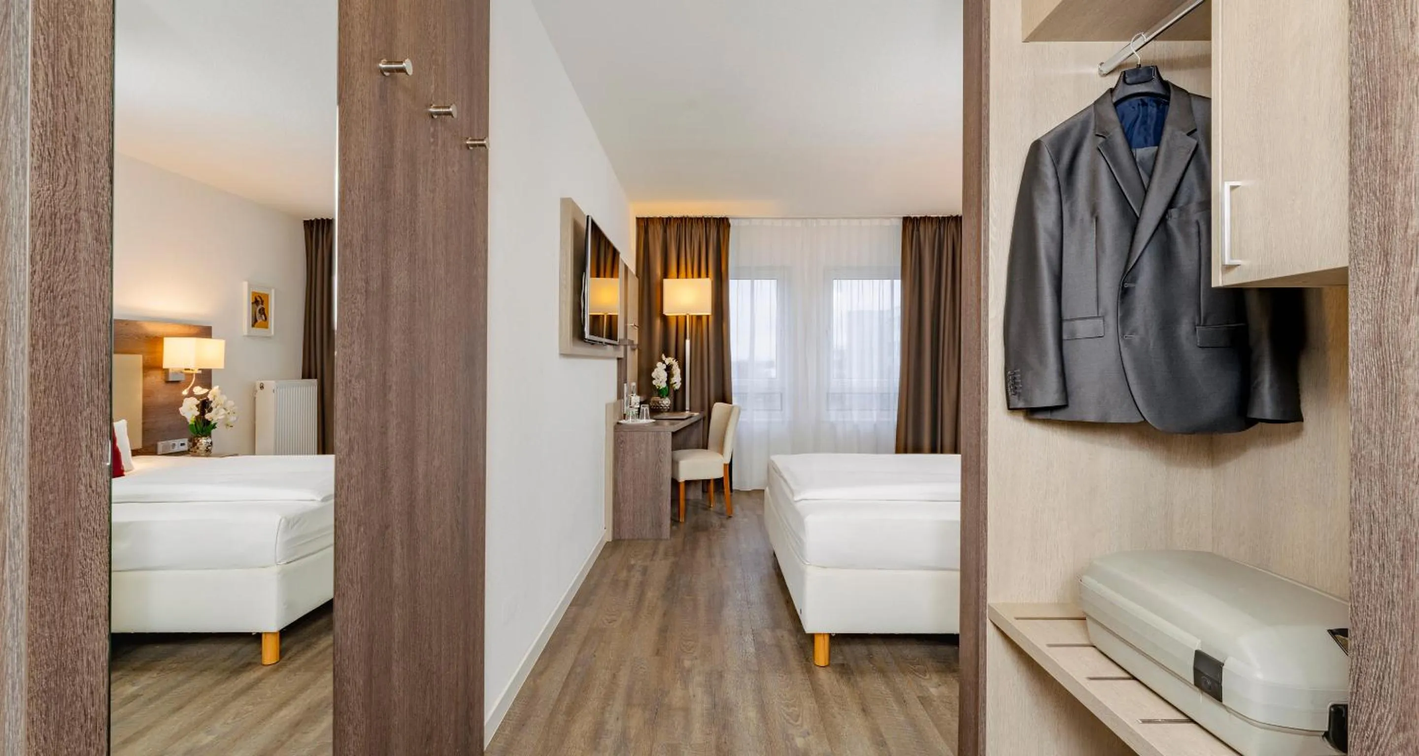 Photo of the whole room, Bed in PLAZA INN Karlsruhe Nord