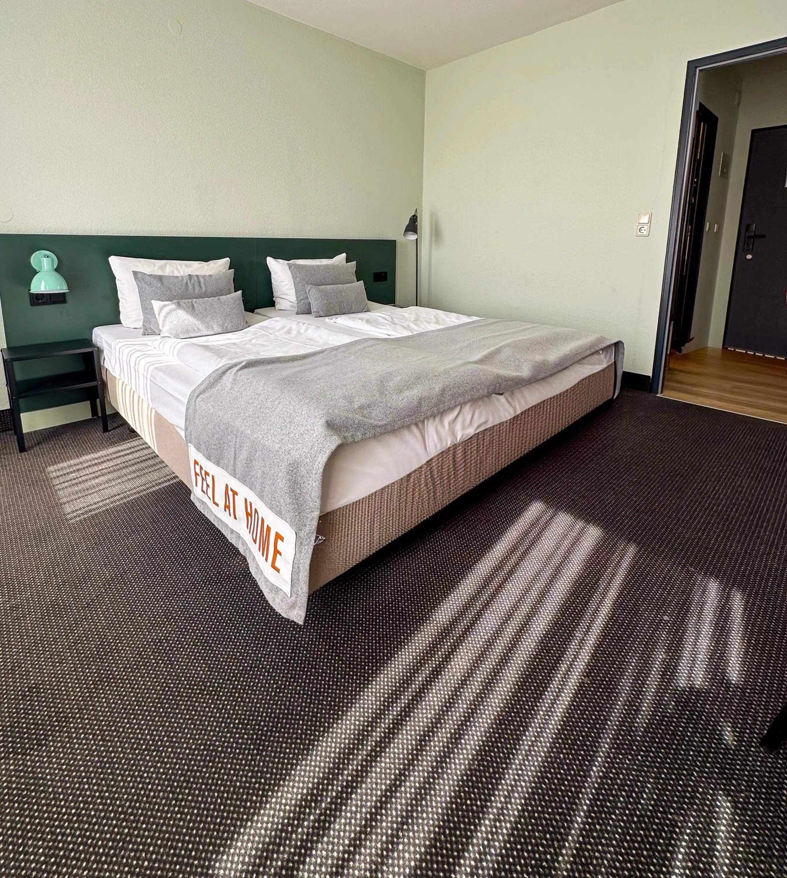 Photo of the whole room, Bed in ACHAT Hotel Frankfurt Airport