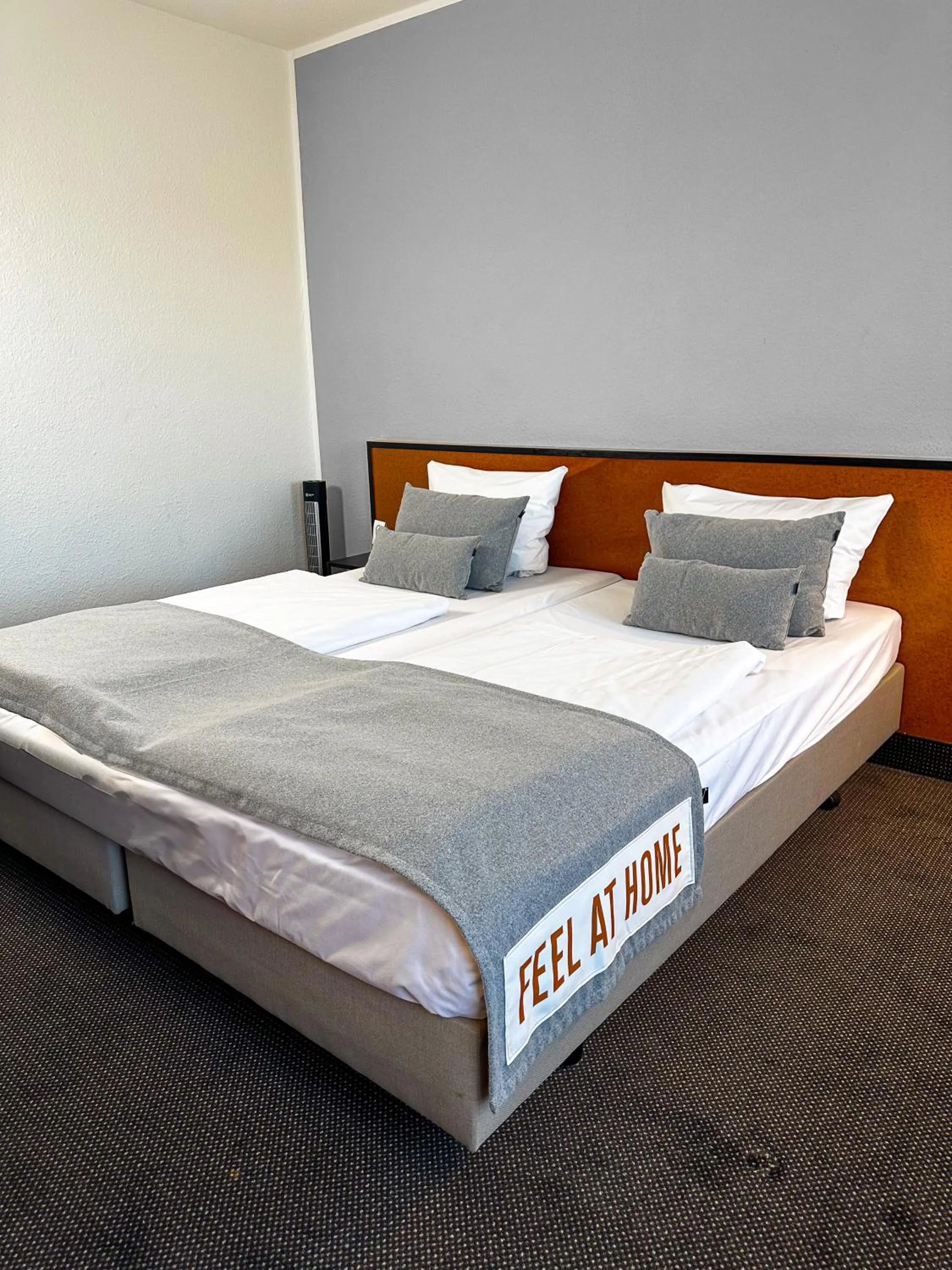 Photo of the whole room, Bed in ACHAT Hotel Frankfurt Airport