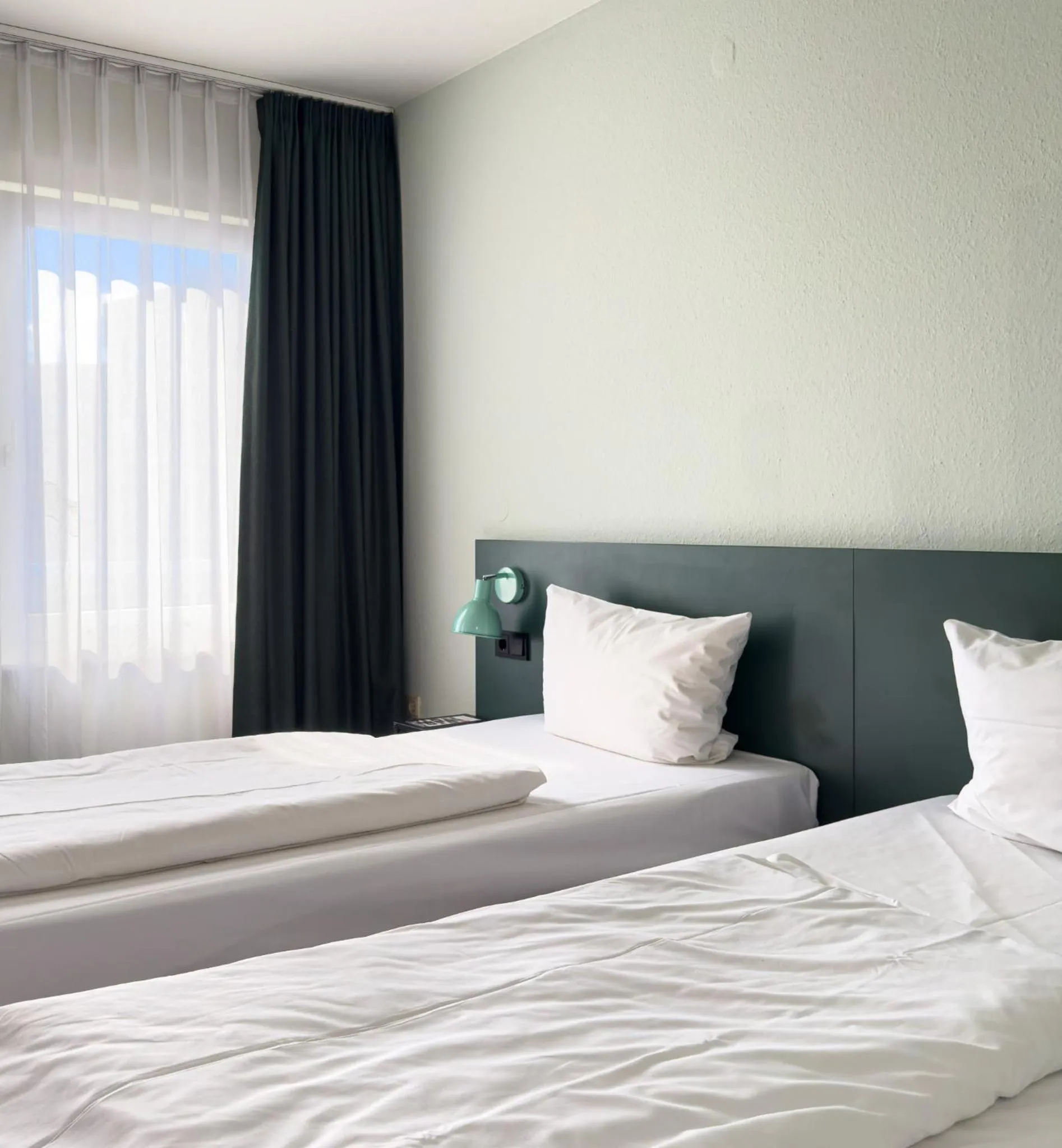 Photo of the whole room, Bed in ACHAT Hotel Frankfurt Airport