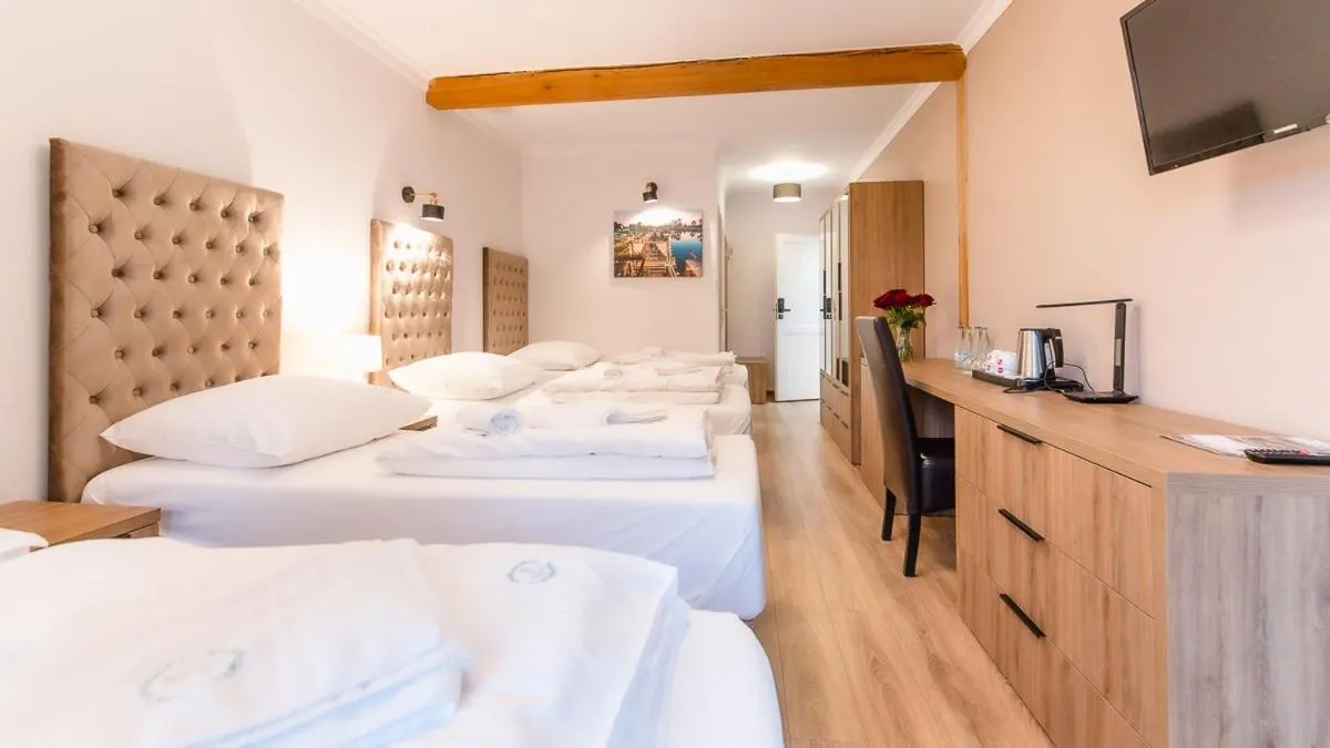 Quadruple Room with Garden View in Apartamenty Kapitańskie