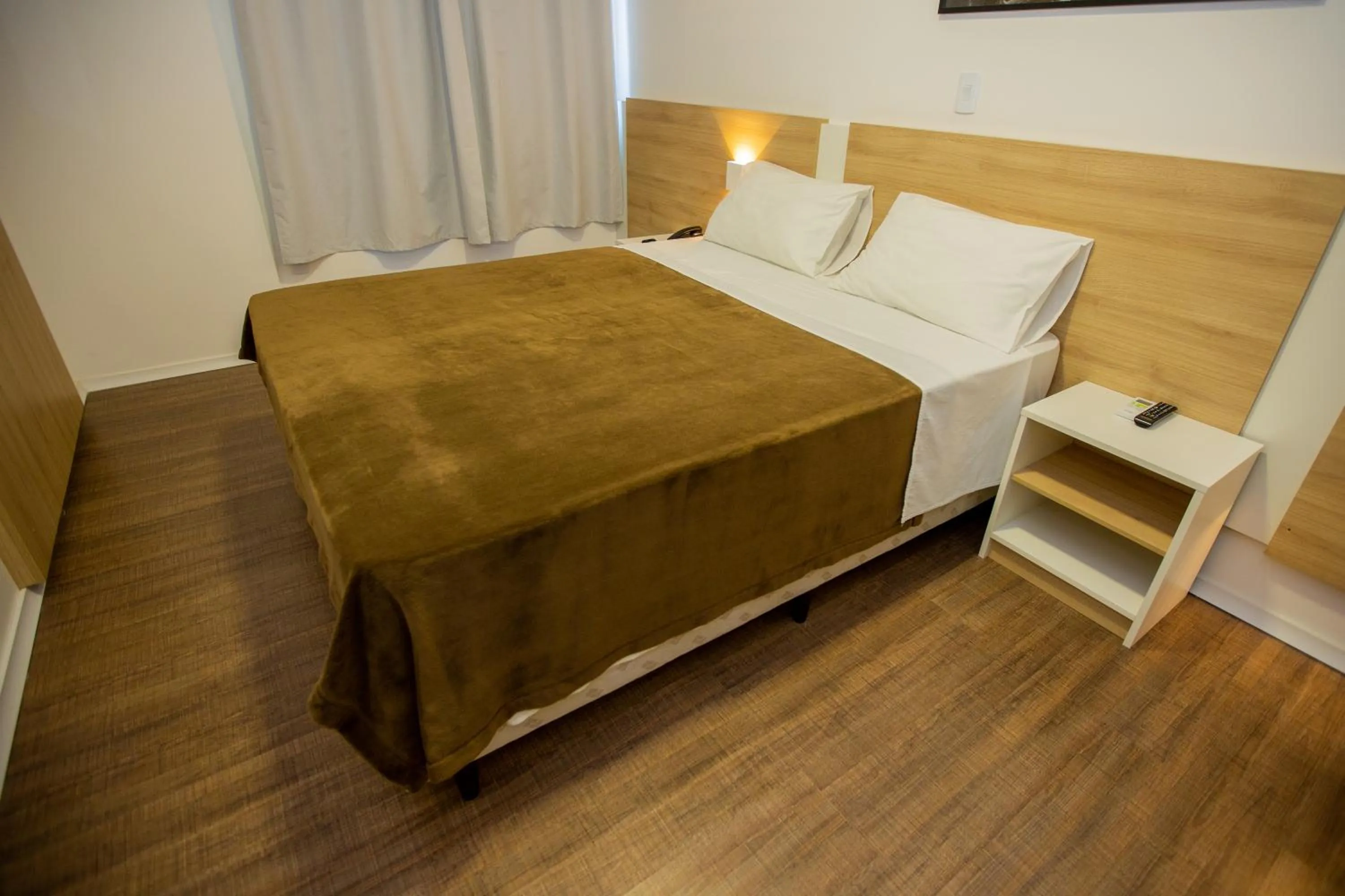 Bed in Tri Hotel Chapecó