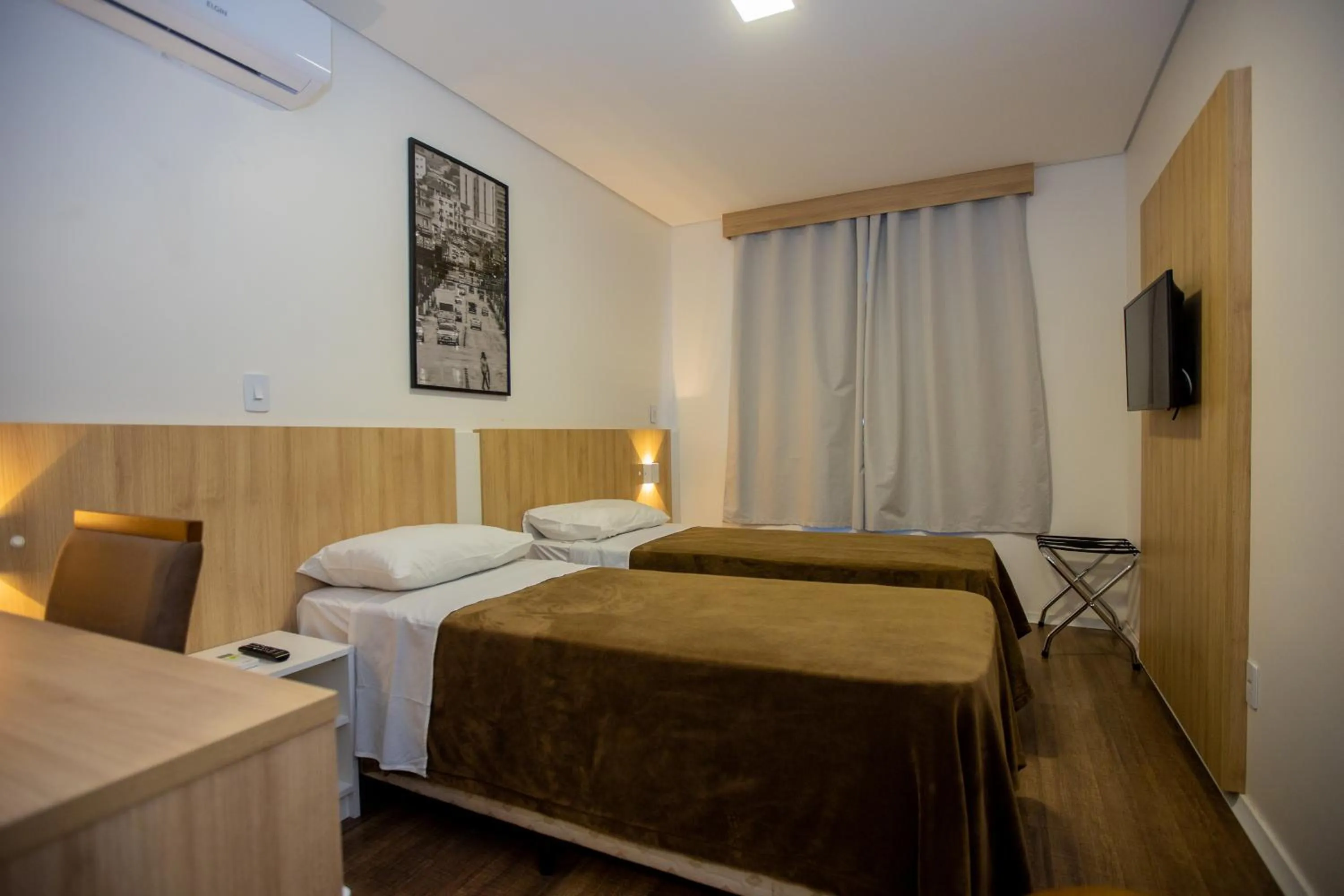 Bed in Tri Hotel Chapecó