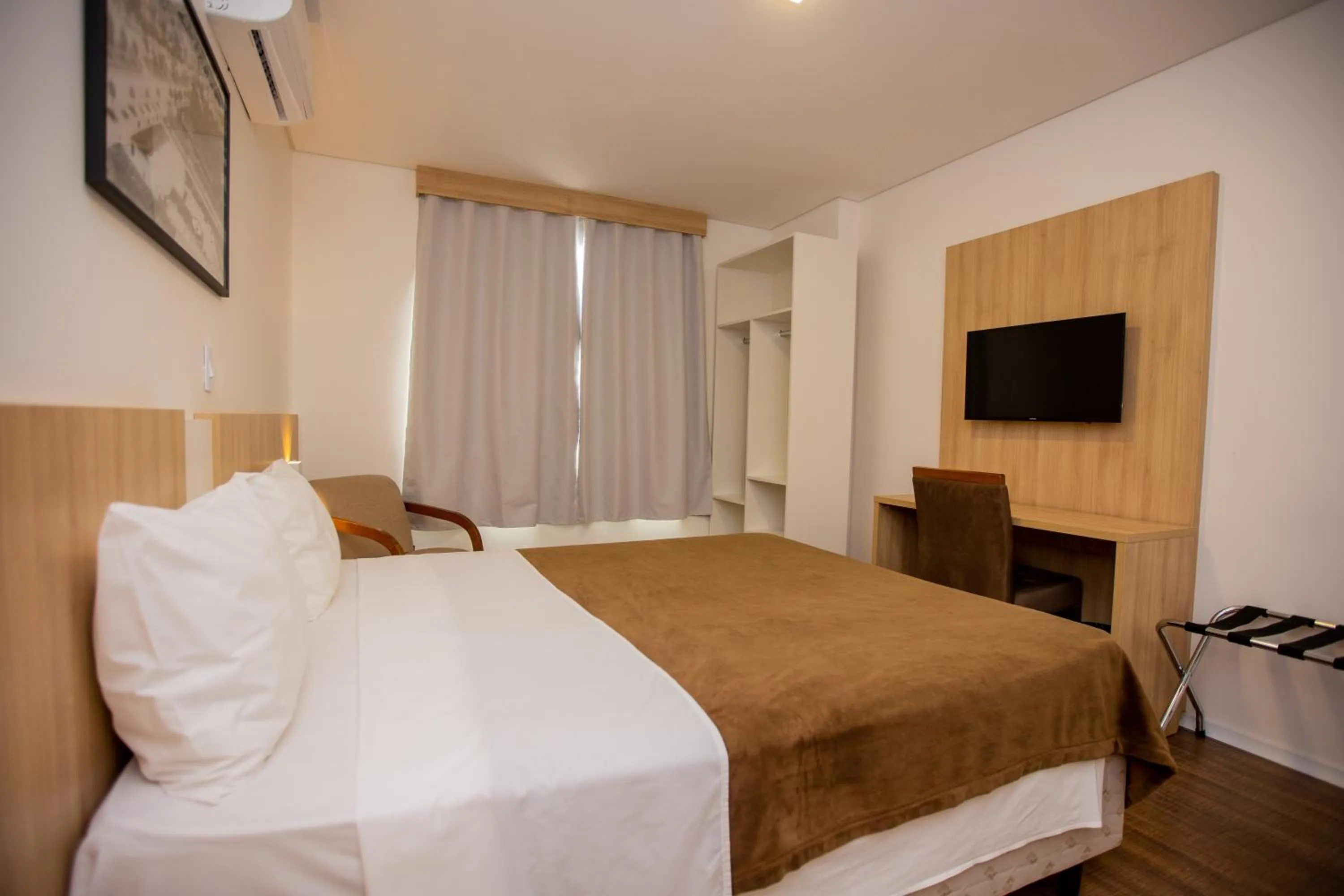 Bed in Tri Hotel Chapecó