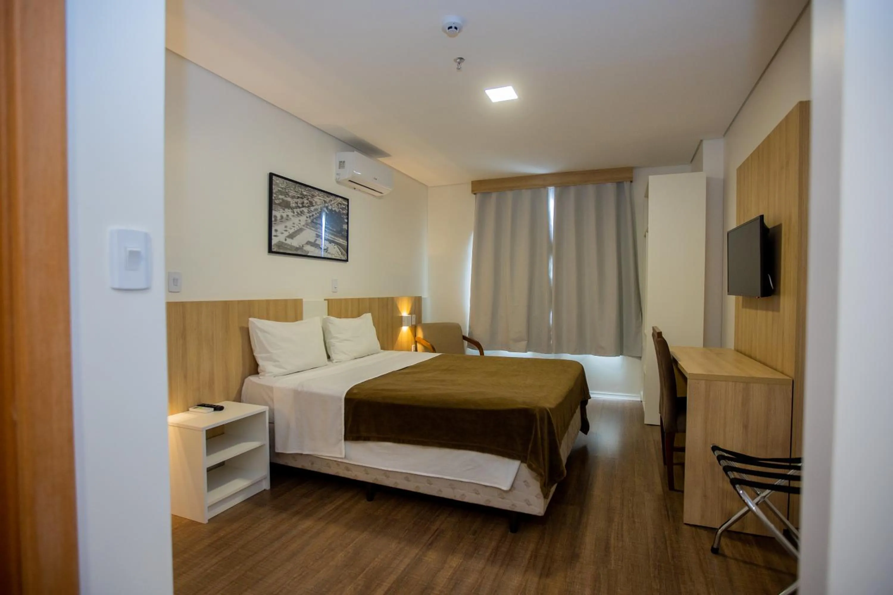 Bed in Tri Hotel Chapecó