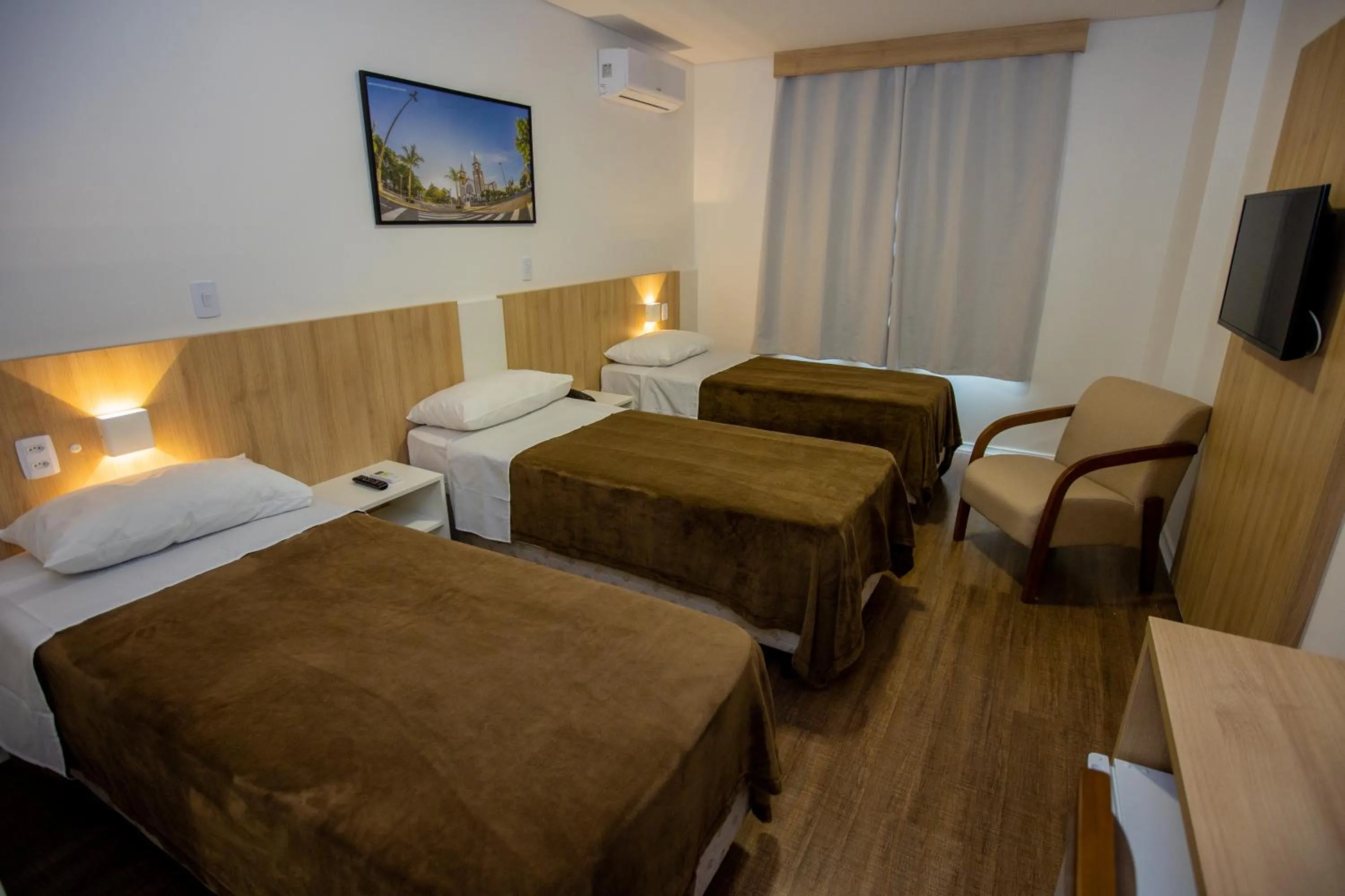 Bed in Tri Hotel Chapecó