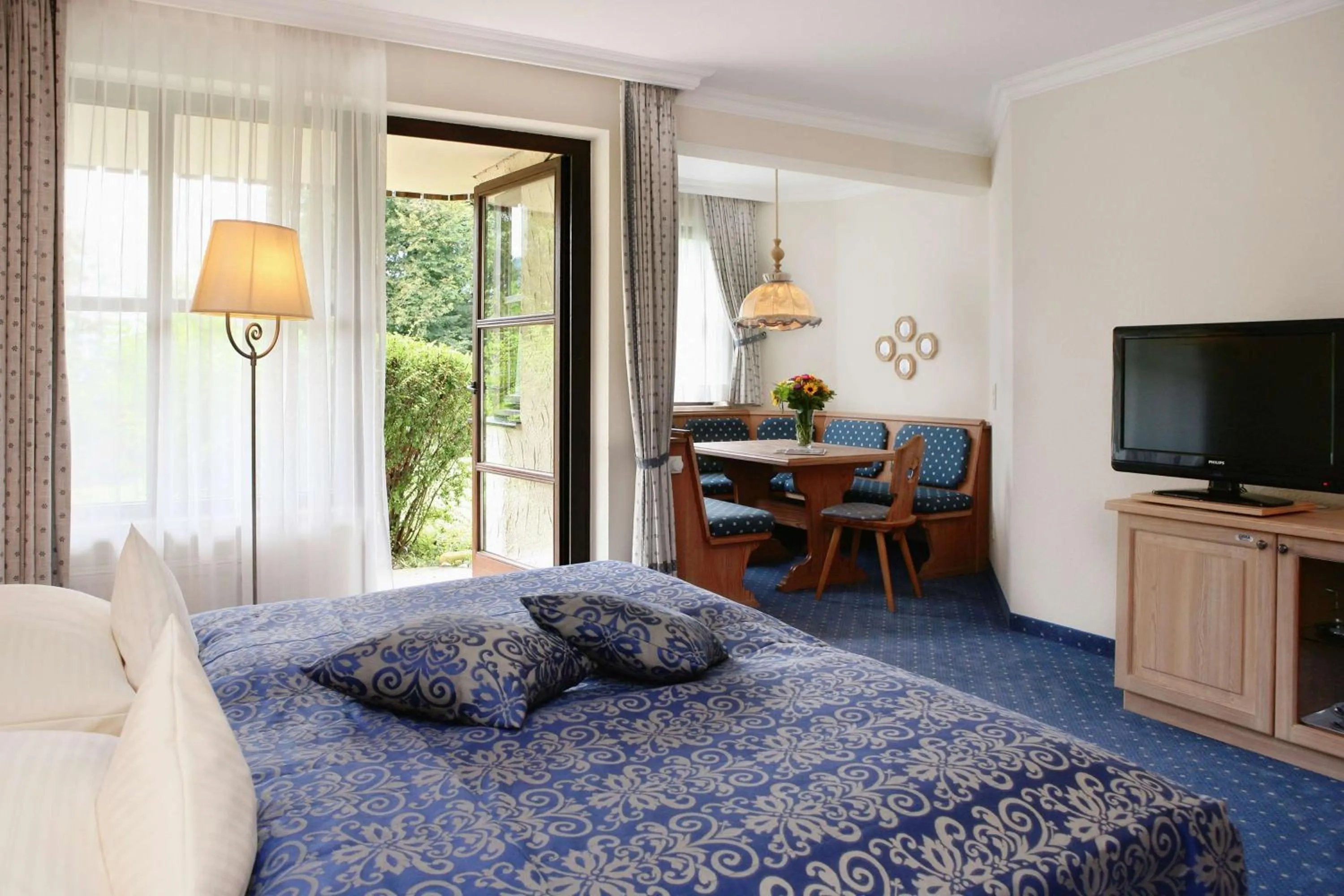 Photo of the whole room, Bed in Dorint Sporthotel Garmisch-Partenkirchen