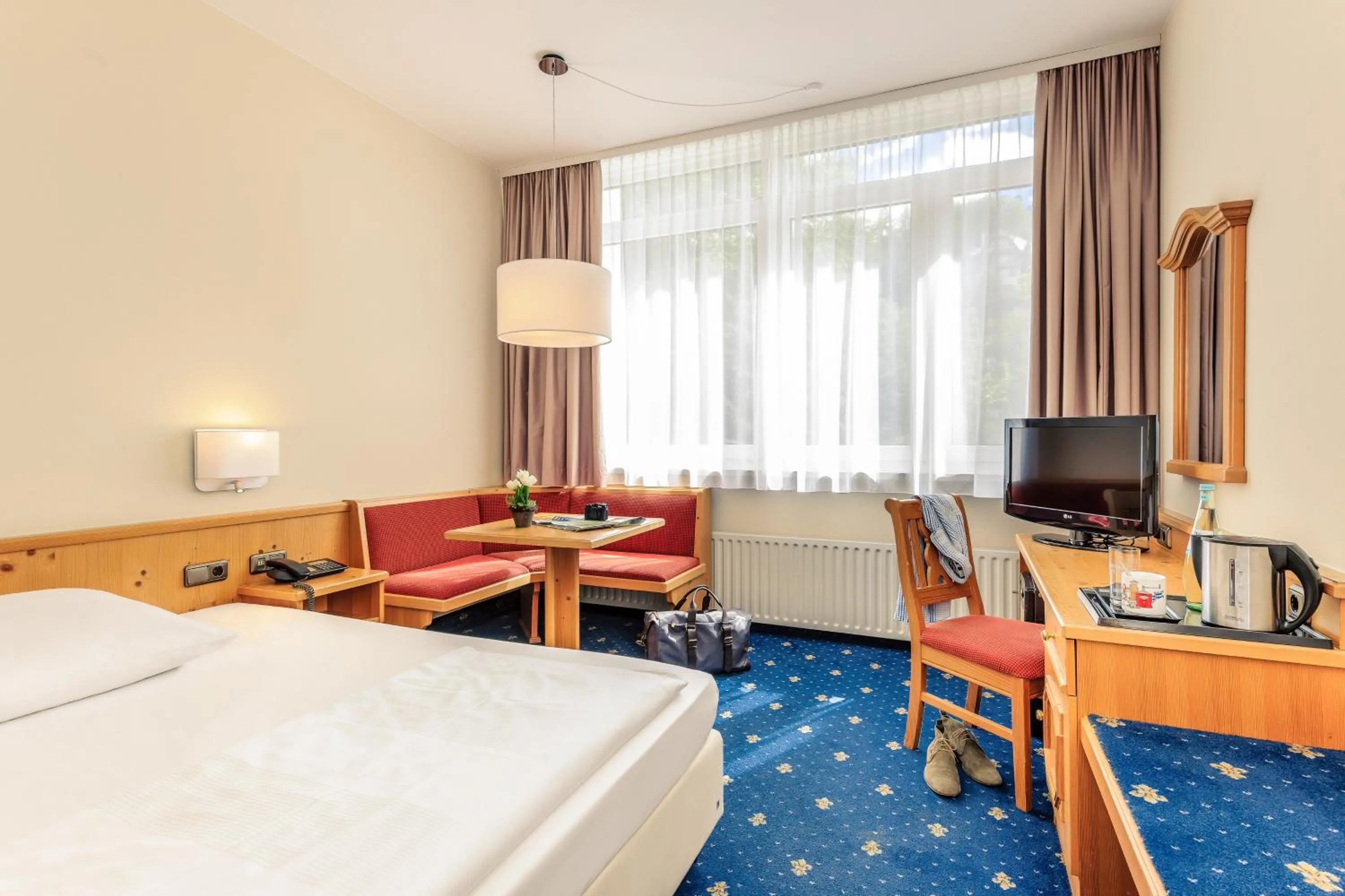 Photo of the whole room, Bed in Mercure Hotel Garmisch Partenkirchen