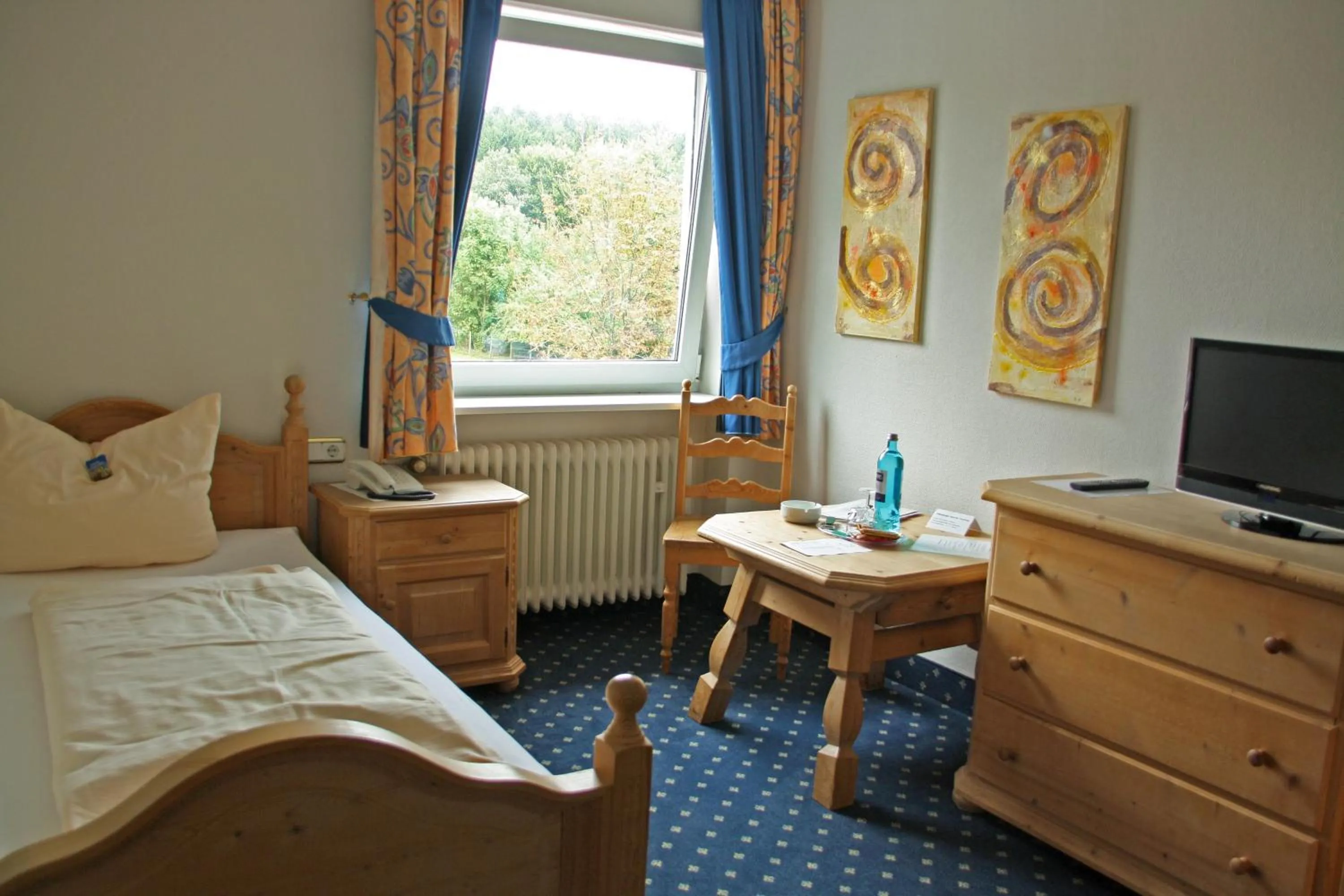 Bedroom, Bed in Wildpark Hotel