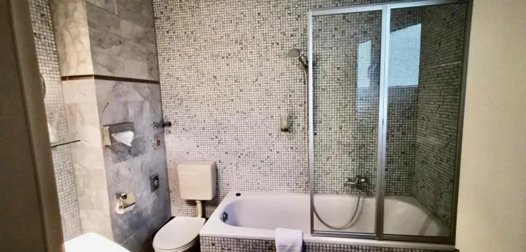Bathroom in ALFA Hotel