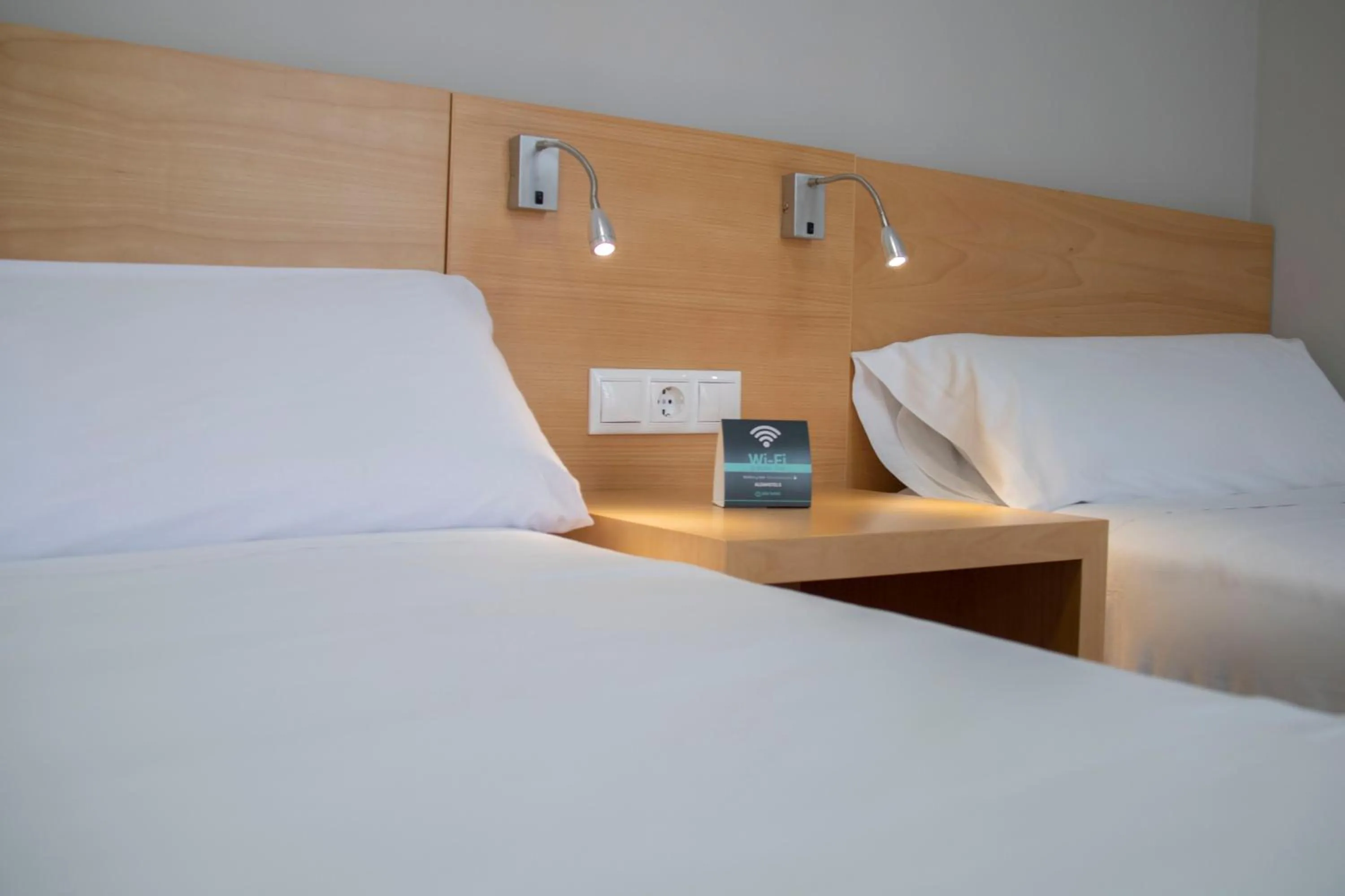 Bed in Alda Alborán Rooms