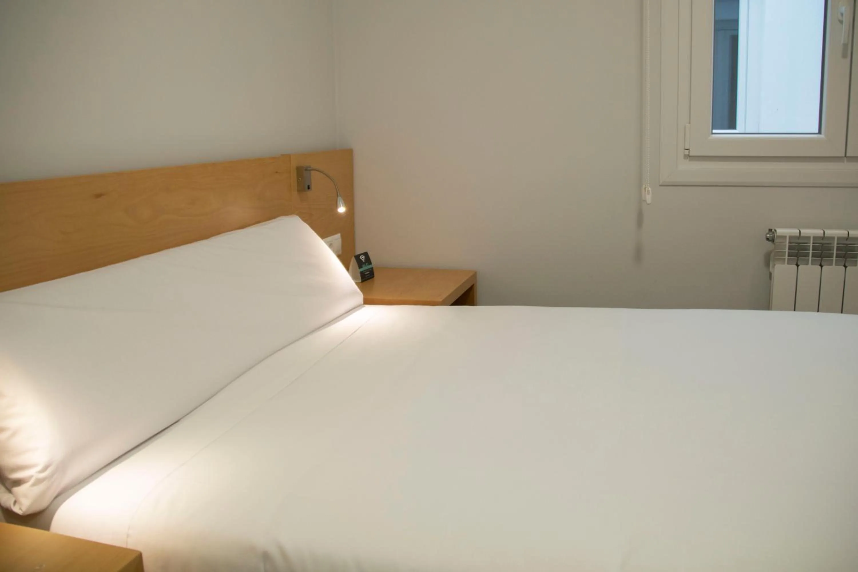 Bed in Alda Alborán Rooms