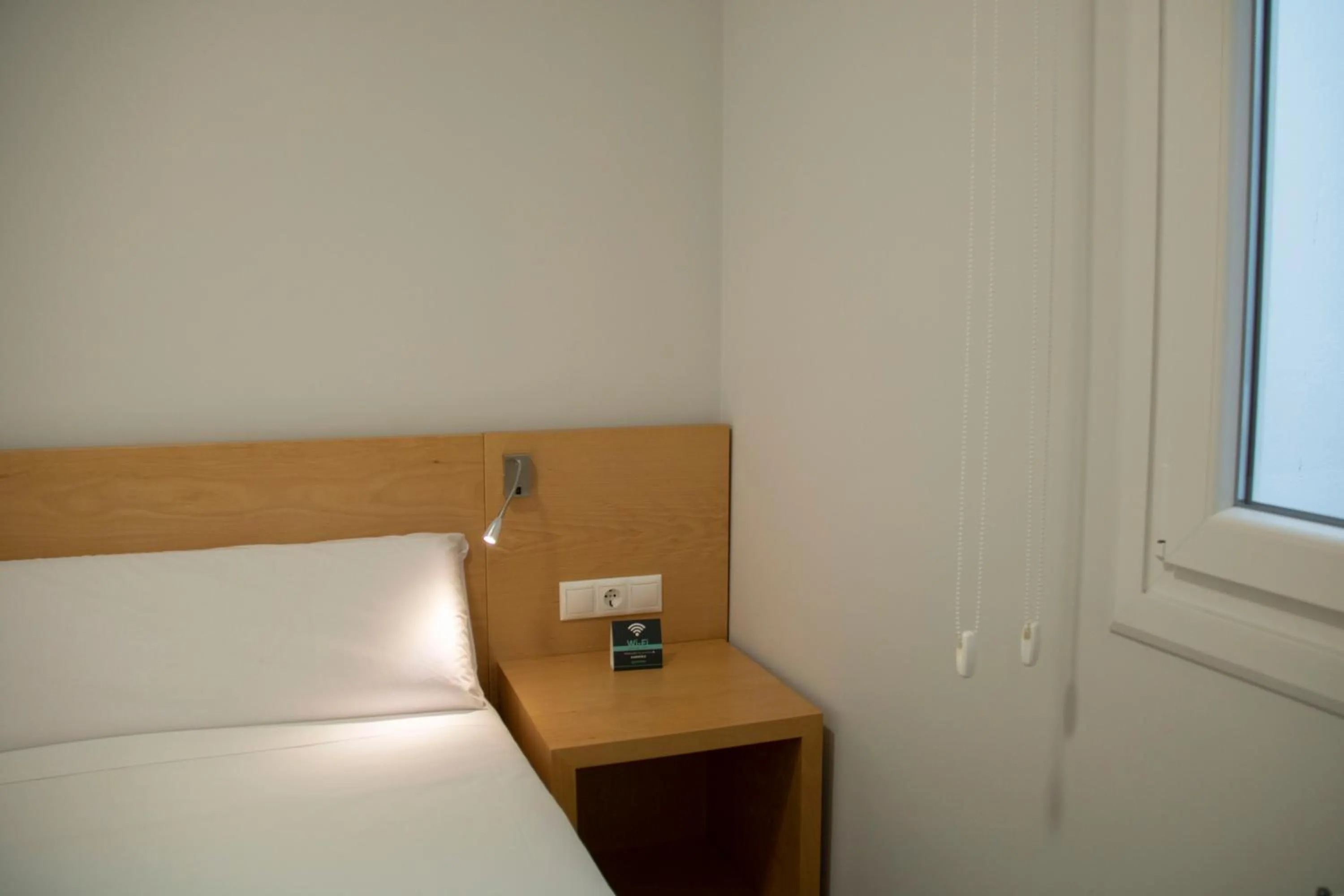 Bed in Alda Alborán Rooms