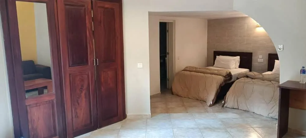 Bed in Tropic Garden Hotel