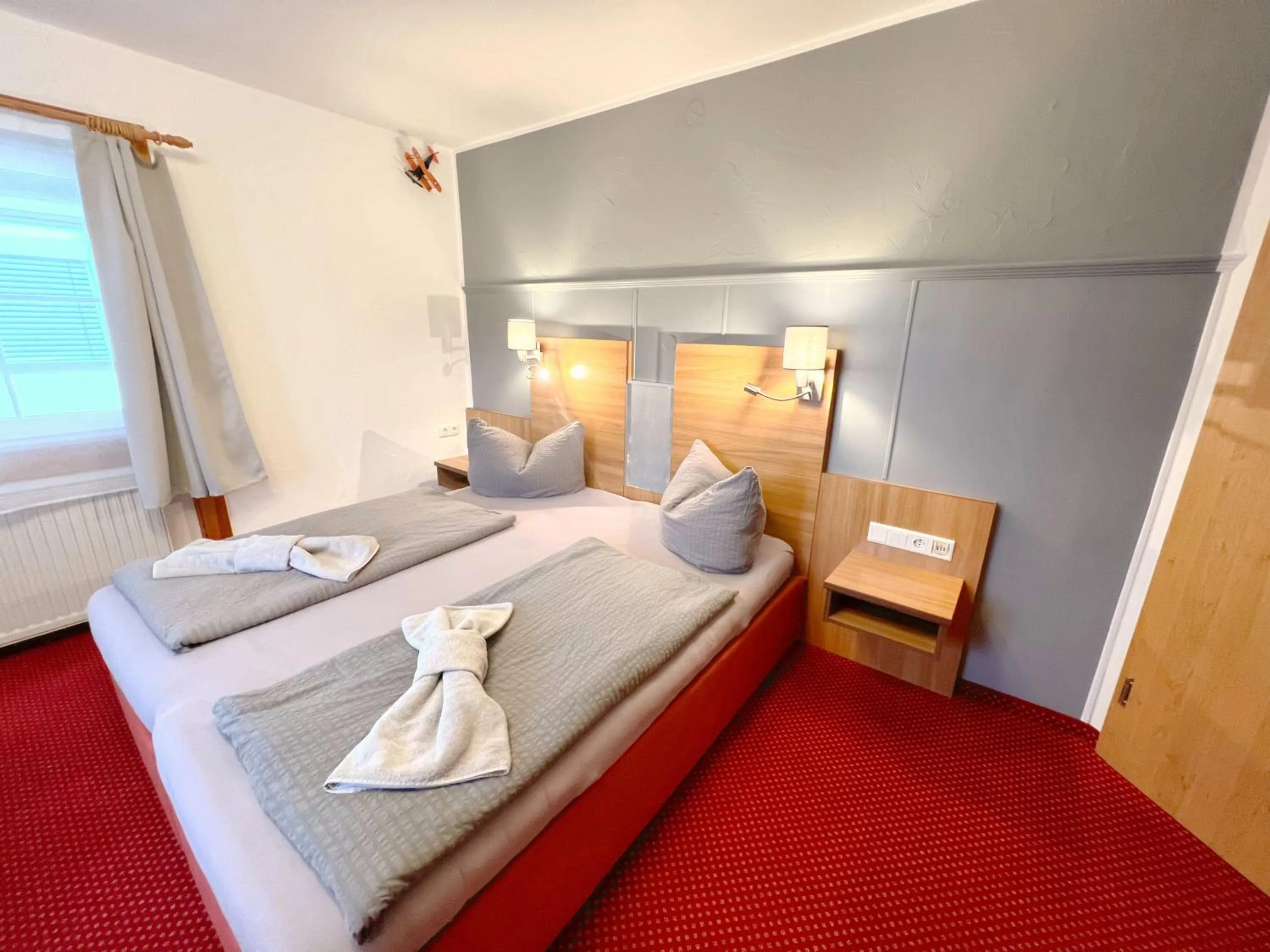 Photo of the whole room, Bed in BnB Fliegerhaeusle Hagnau 24h Self Check In