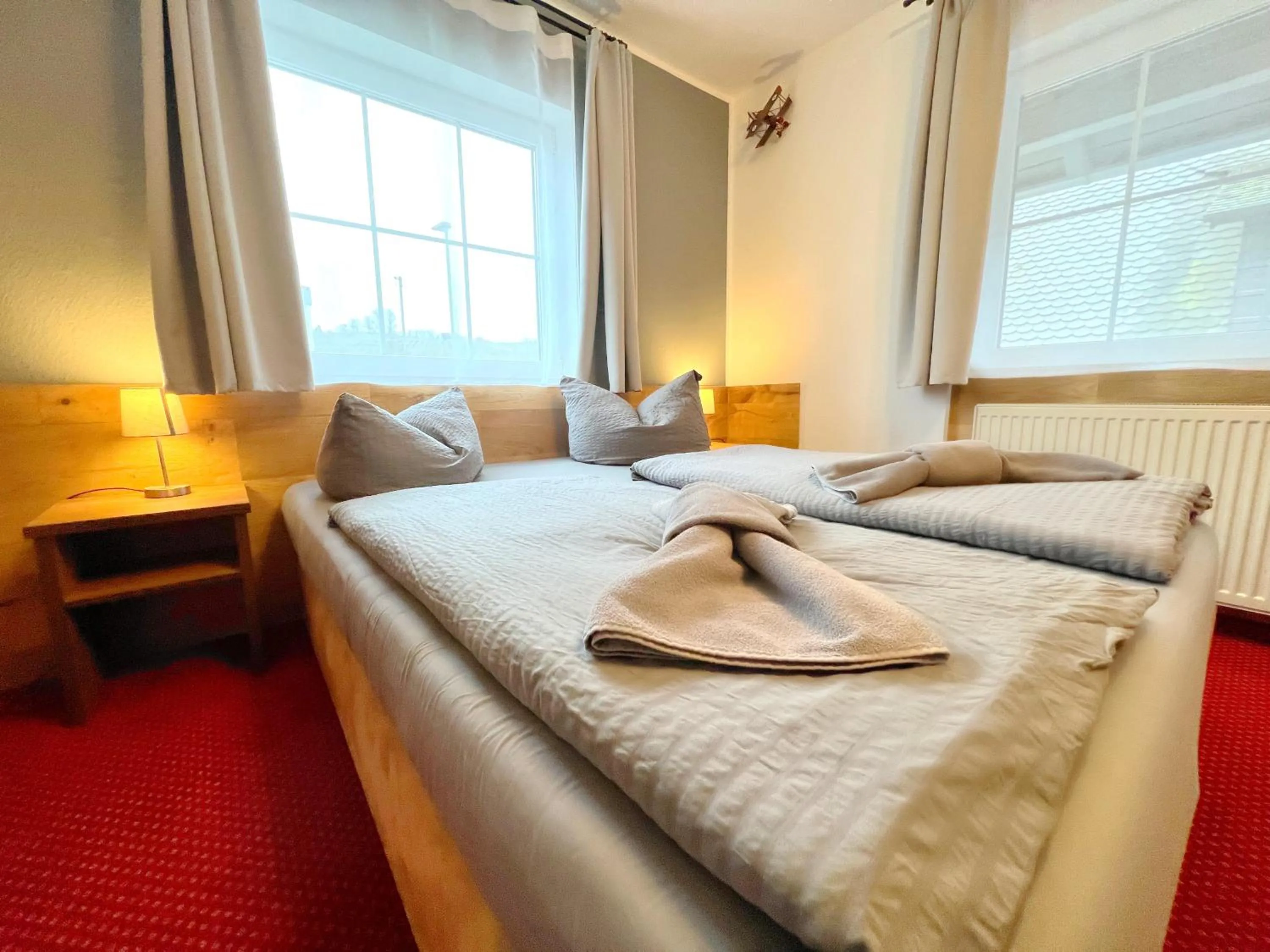 Photo of the whole room, Bed in BnB Fliegerhaeusle Hagnau 24h Self Check In