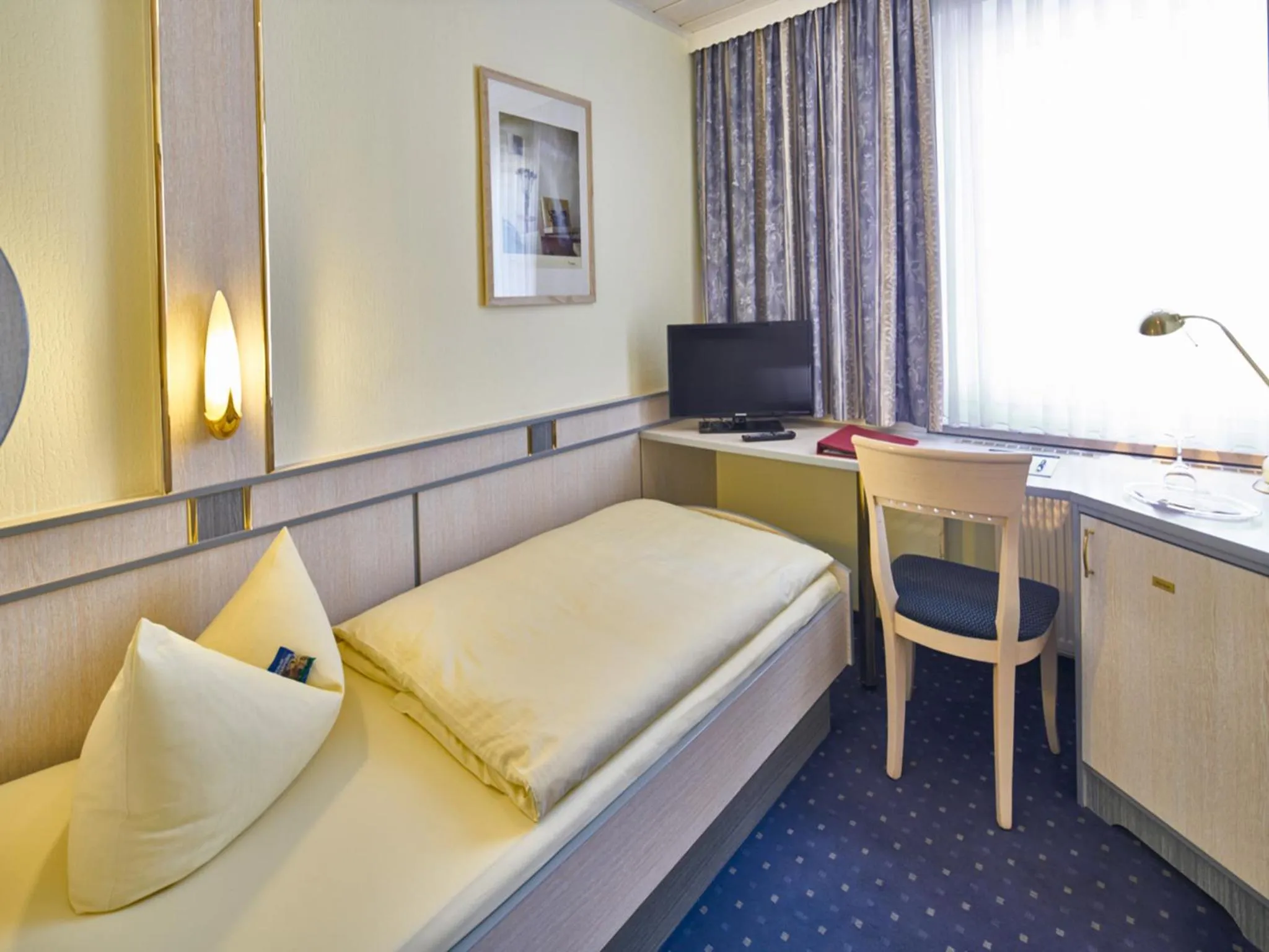 Photo of the whole room, Bed in Hotel Alfa Zentrum