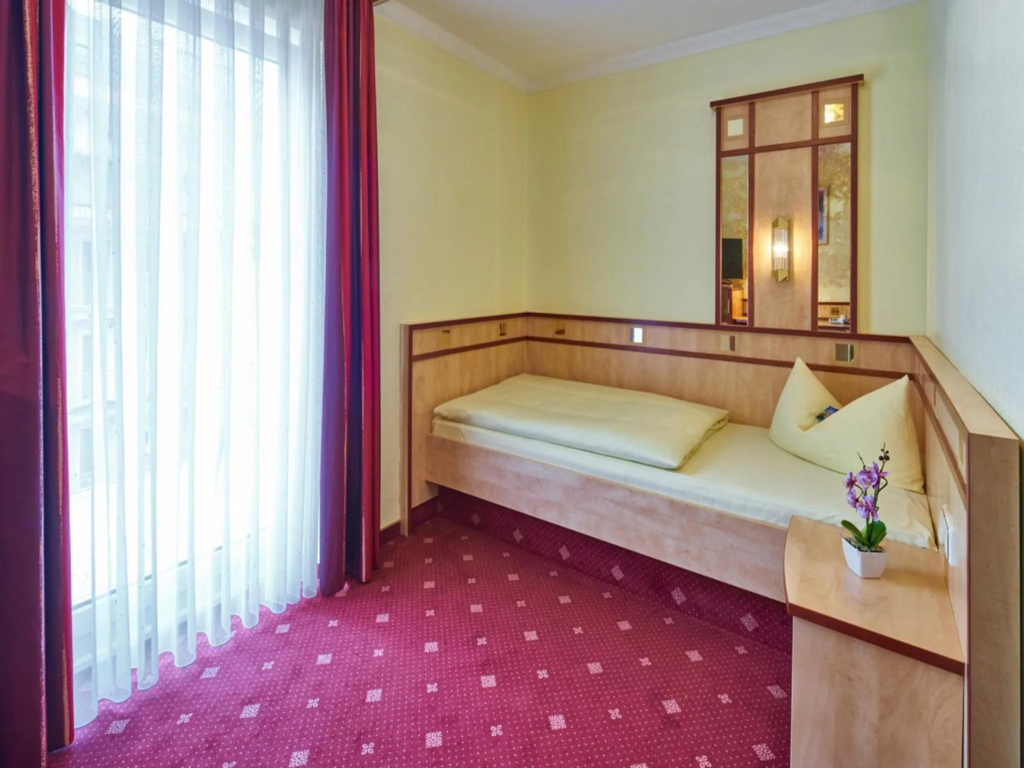 Bed in Hotel Alfa Zentrum
