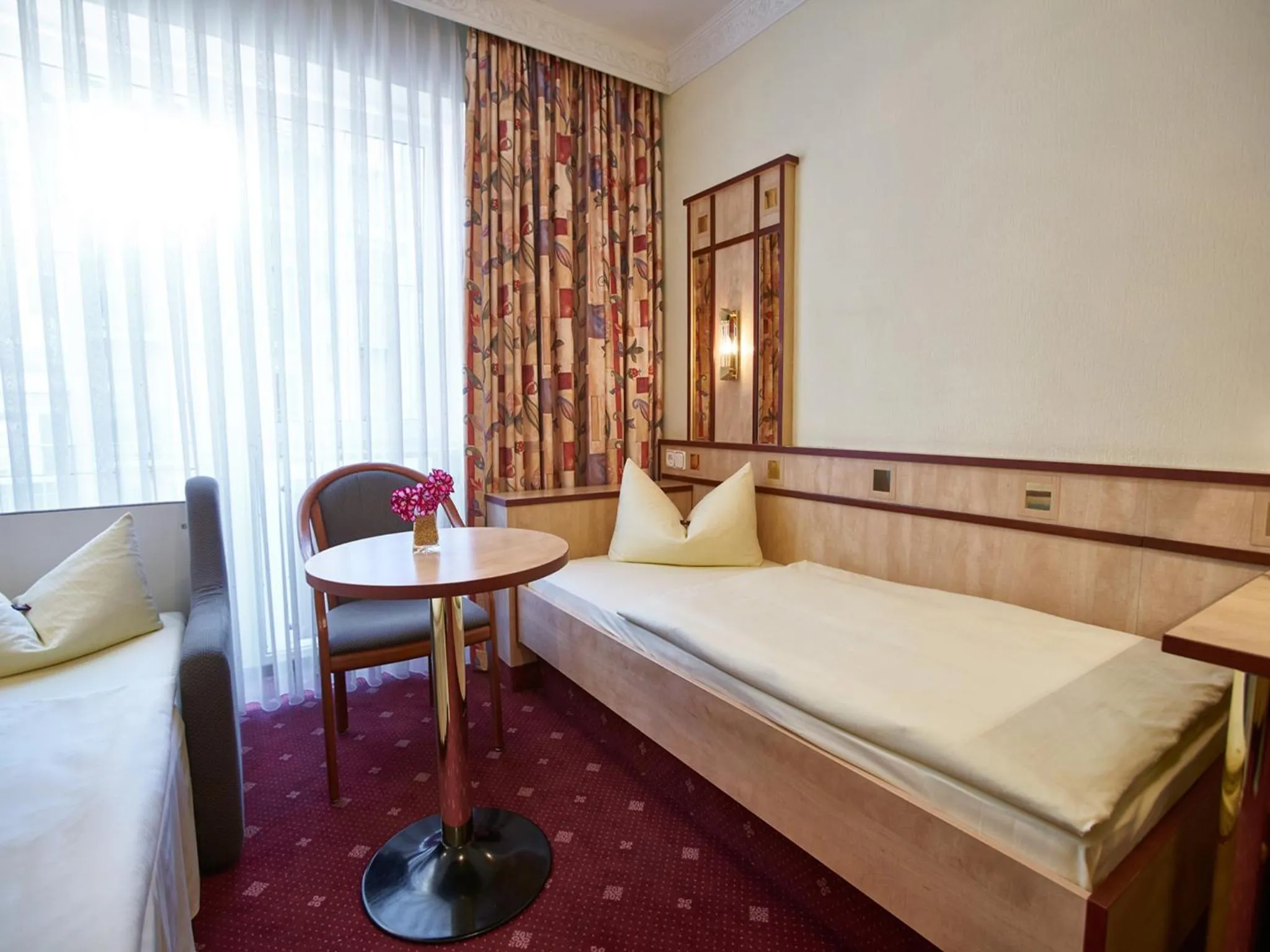 Bed in Hotel Alfa Zentrum