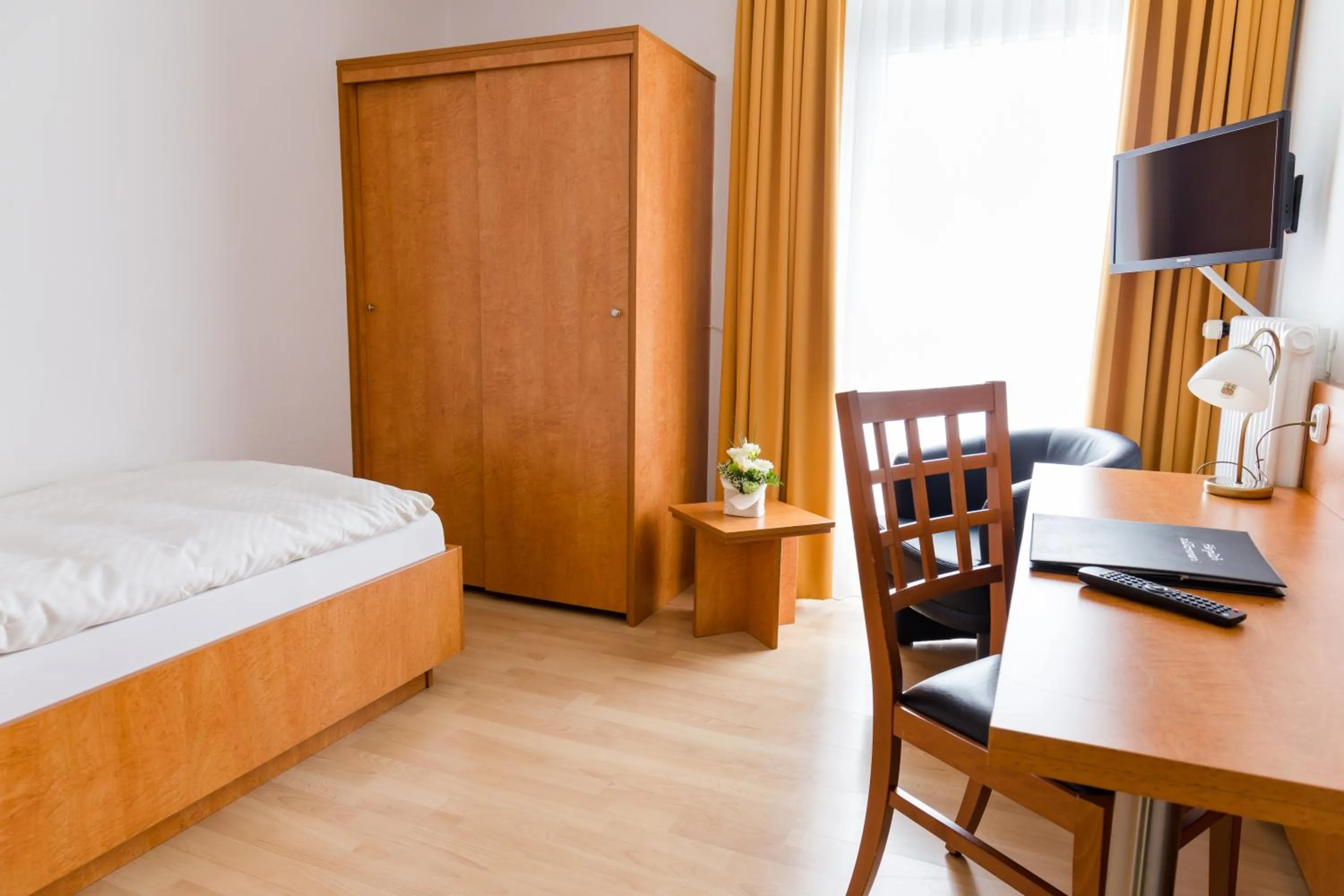 Bed in Gästehaus Wilgersdorf GmbH