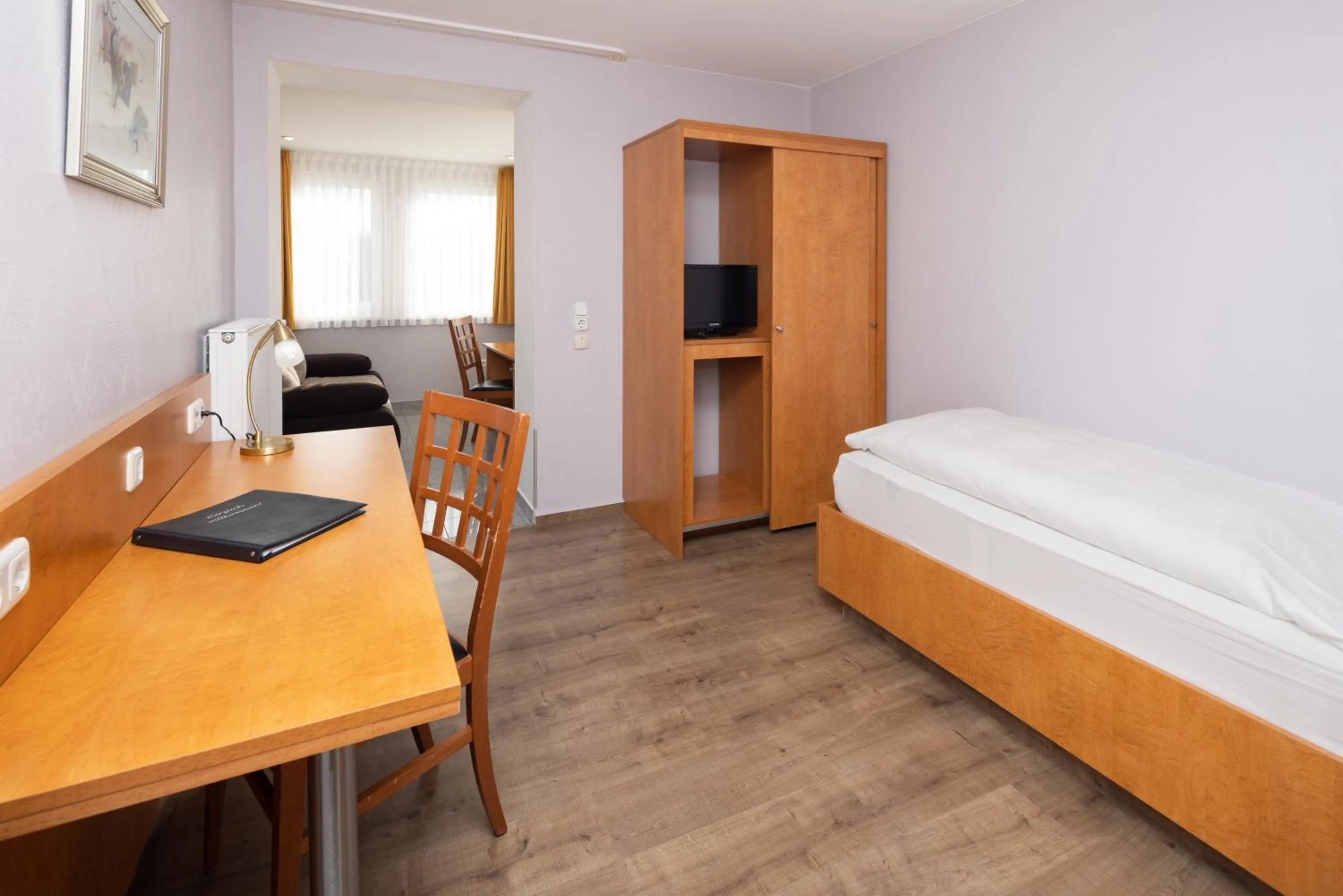 Bed in Gästehaus Wilgersdorf GmbH