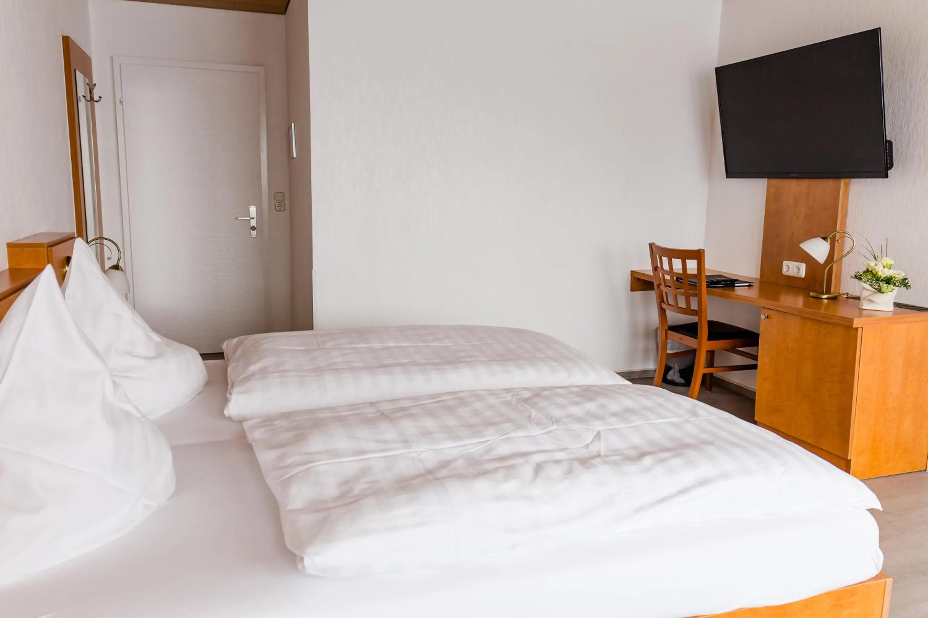 Bed in Gästehaus Wilgersdorf GmbH