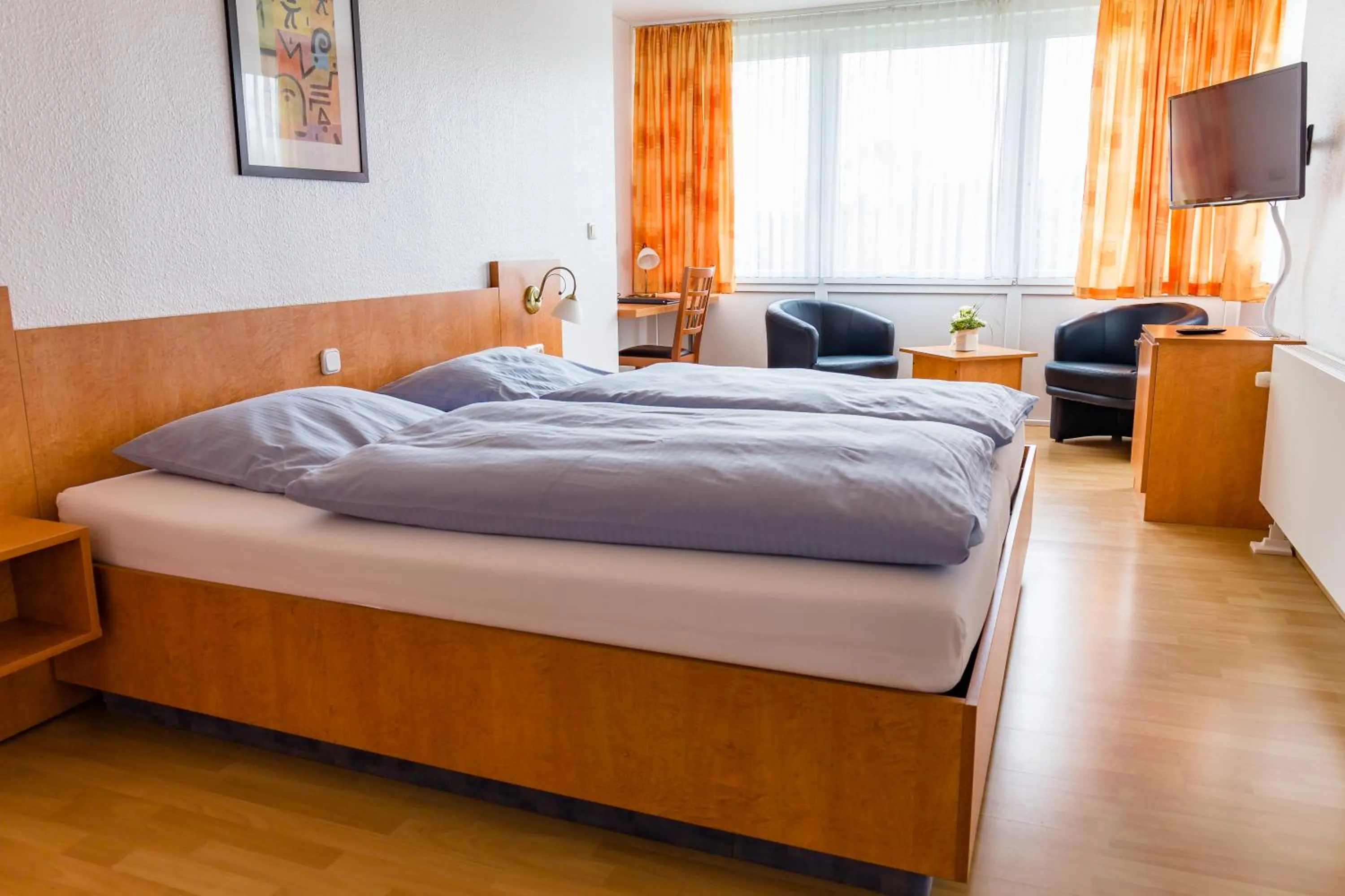 Bed in Gästehaus Wilgersdorf GmbH