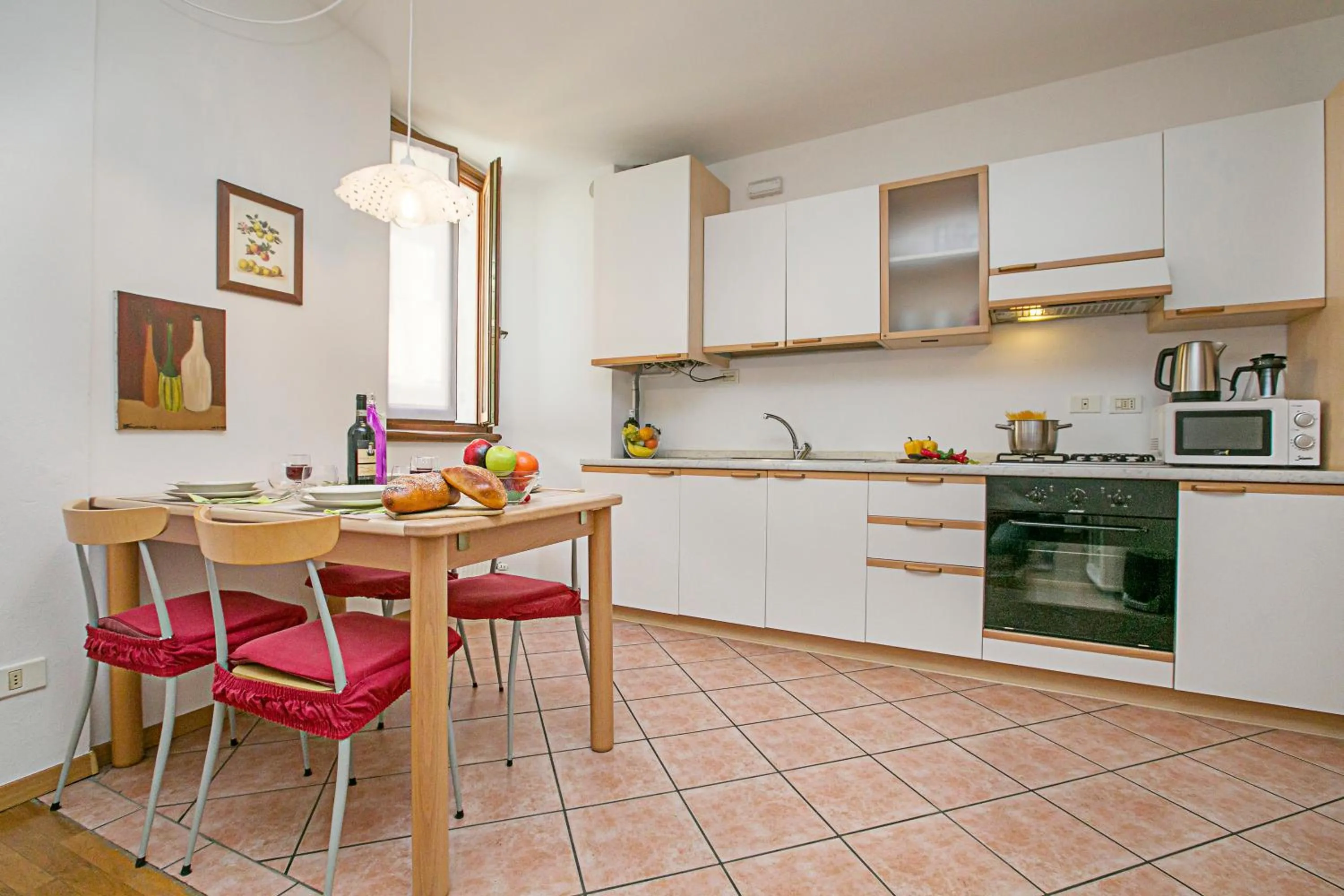 Kitchen or kitchenette in Appartamento Centro Storico Riva 2 - Happy Rentals
