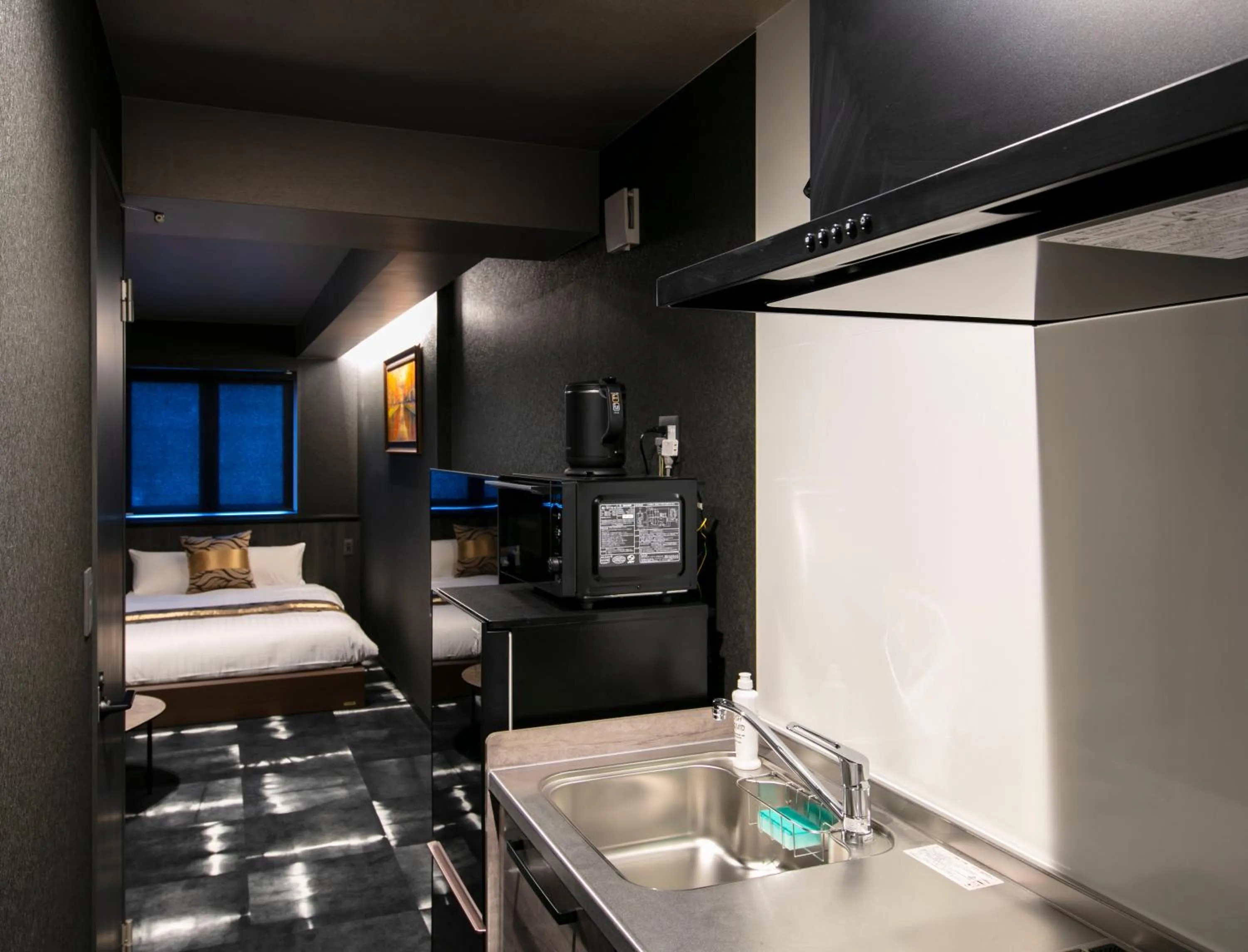 Photo of the whole room, Bed in GRAND BASE Takamatsu