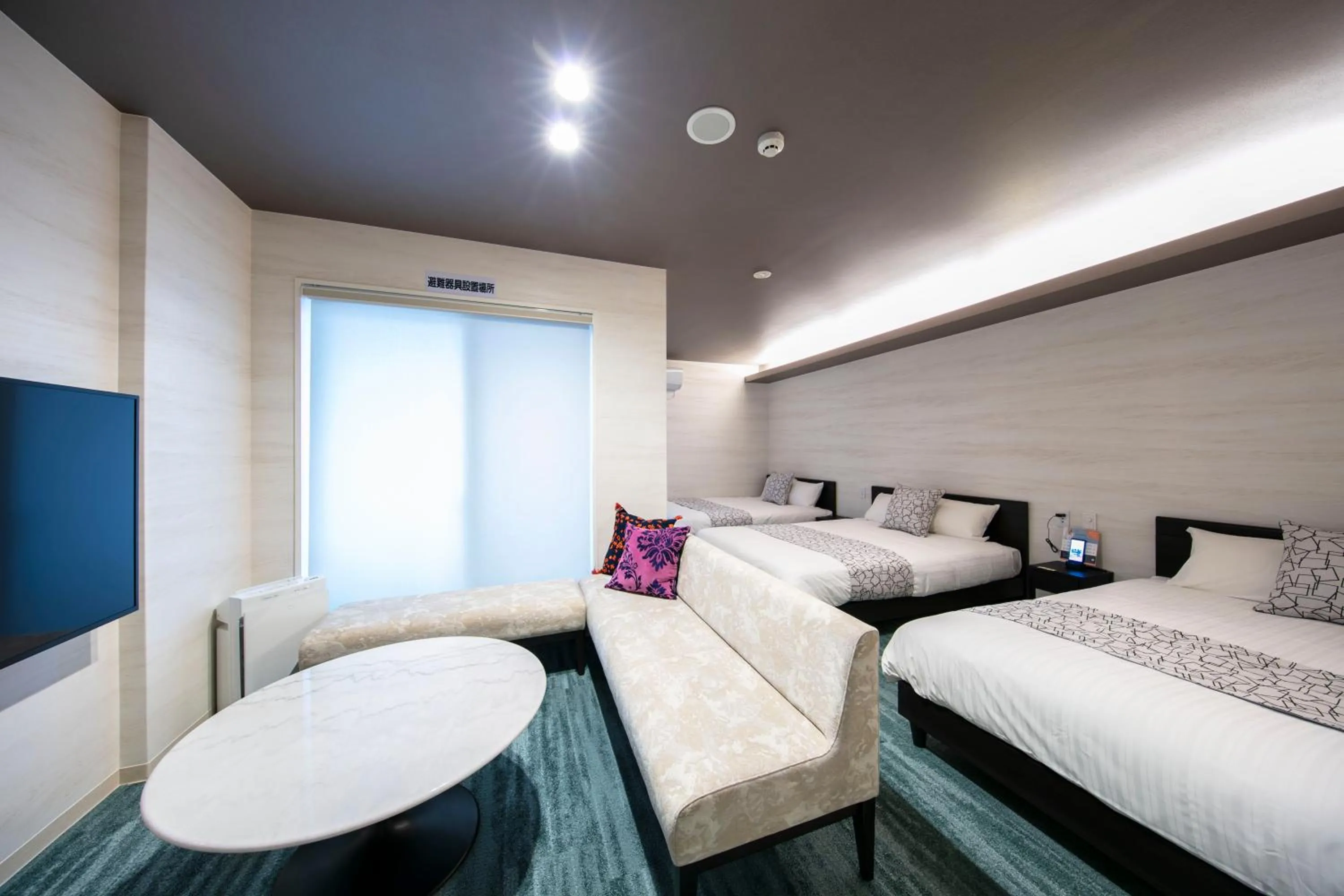 Photo of the whole room, Bed in GRAND BASE Takamatsu