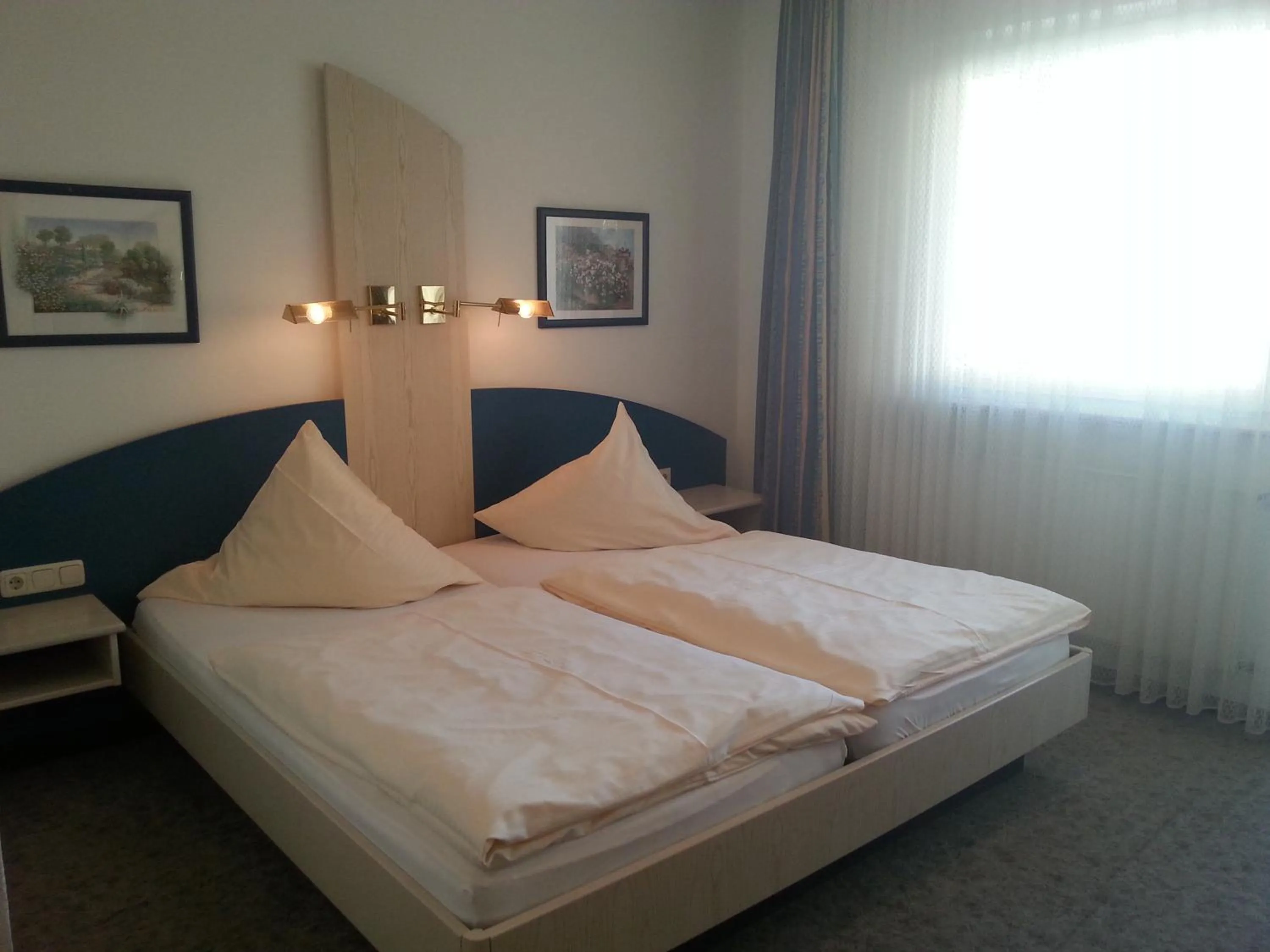 Bed in Hotel Restaurant Rückert