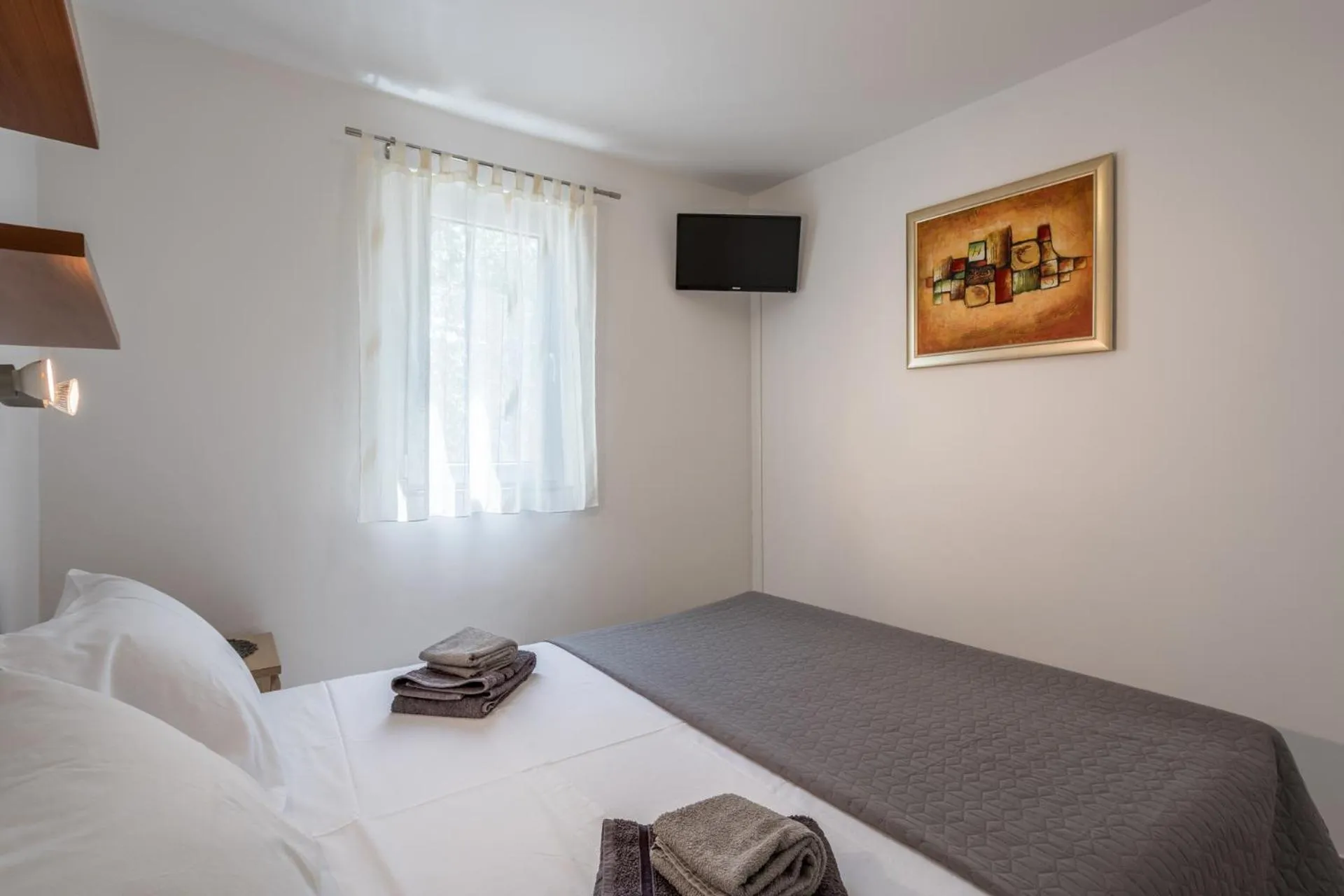 House with big walled oliva garden