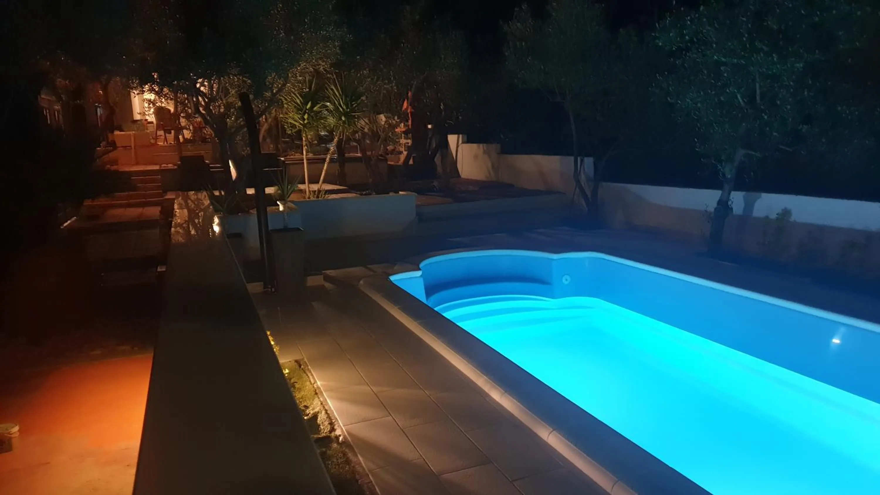 Swimming Pool in House with big walled oliva garden