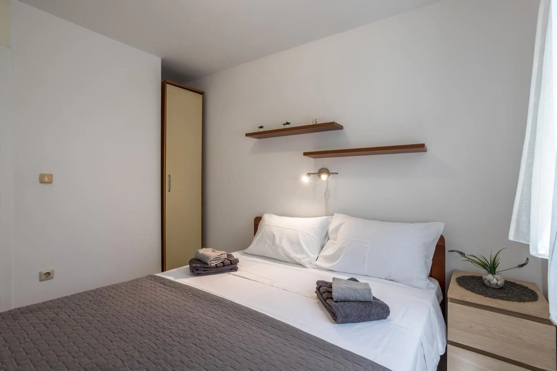 House with big walled oliva garden