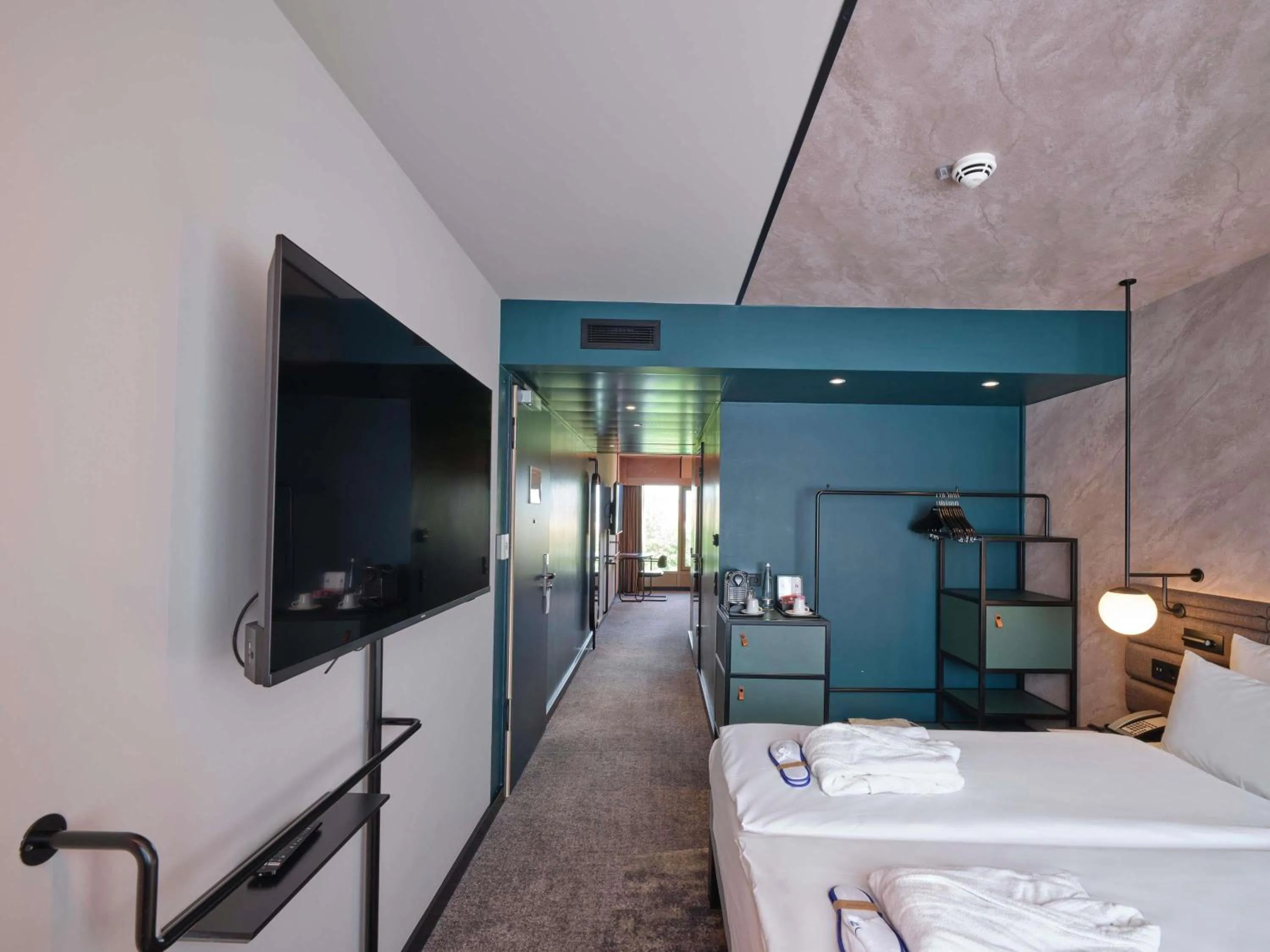 Bedroom in Novotel München City