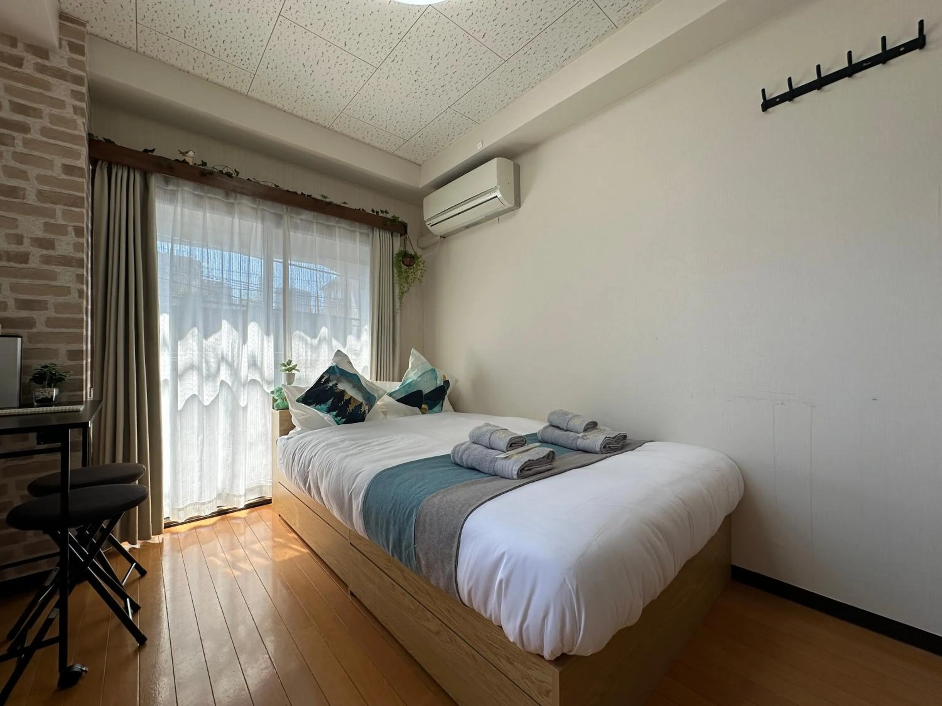 Bed in nestay suite tokyo tabata