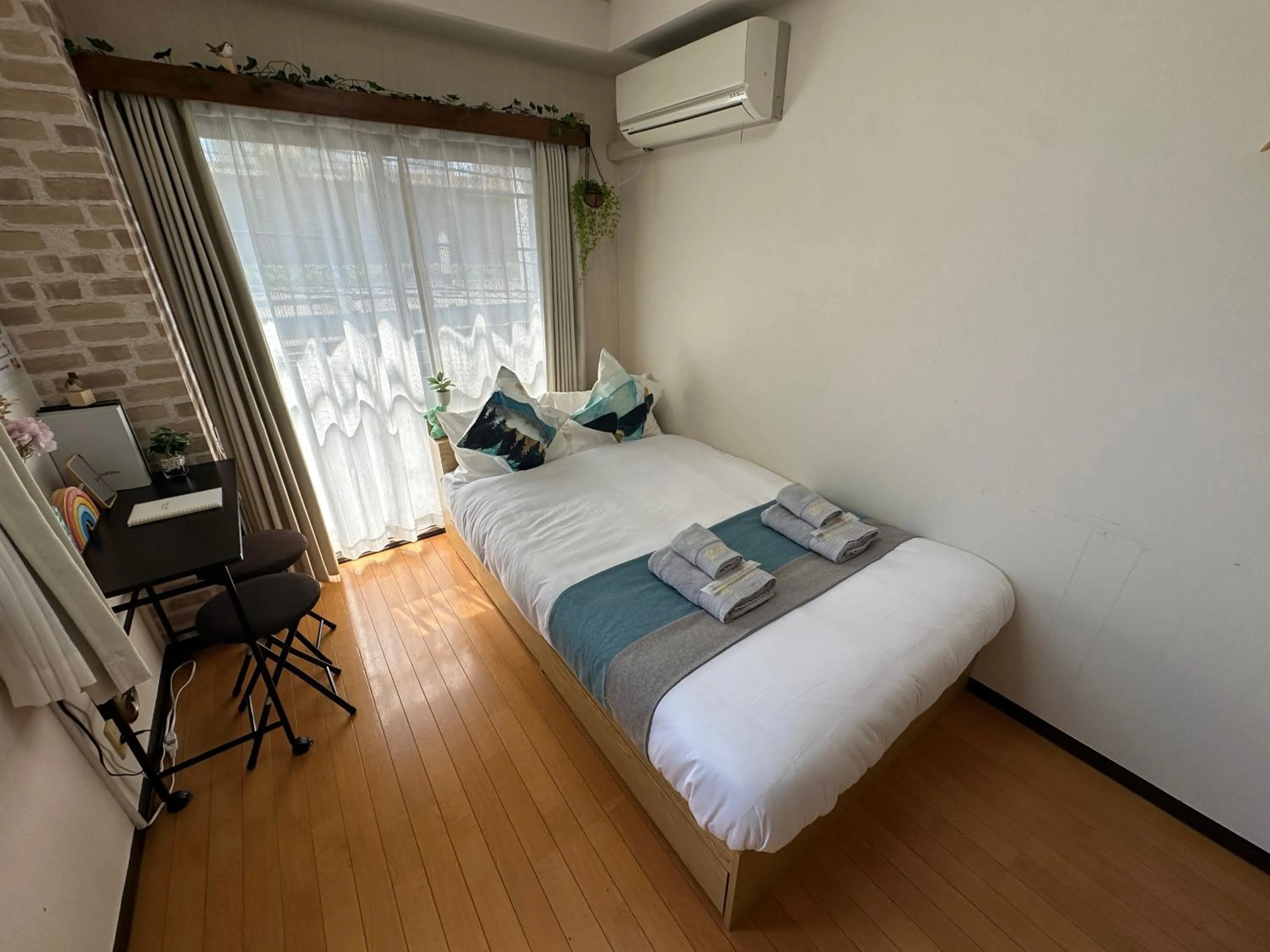 Bed in nestay suite tokyo tabata