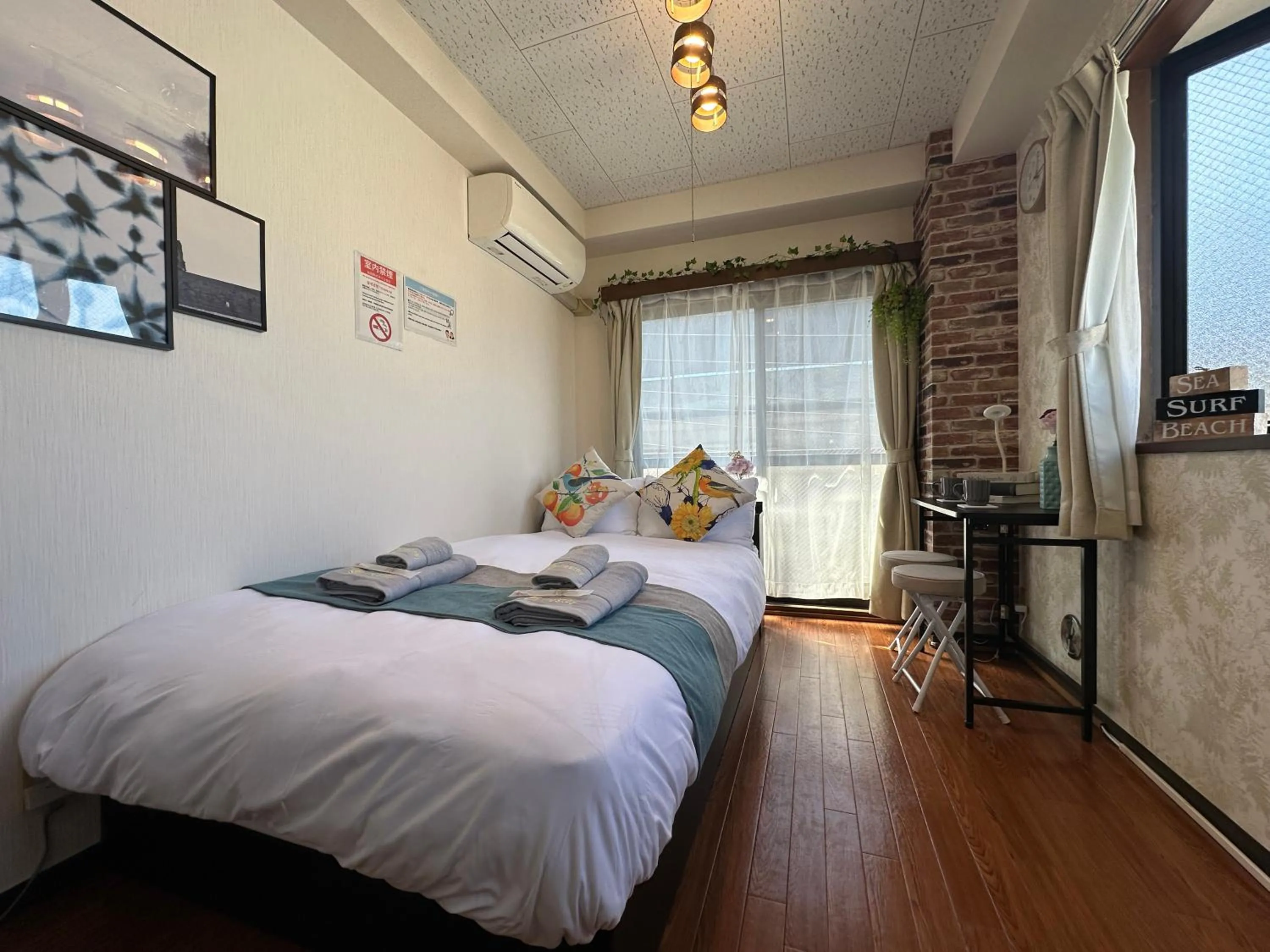 Bed in nestay suite tokyo tabata