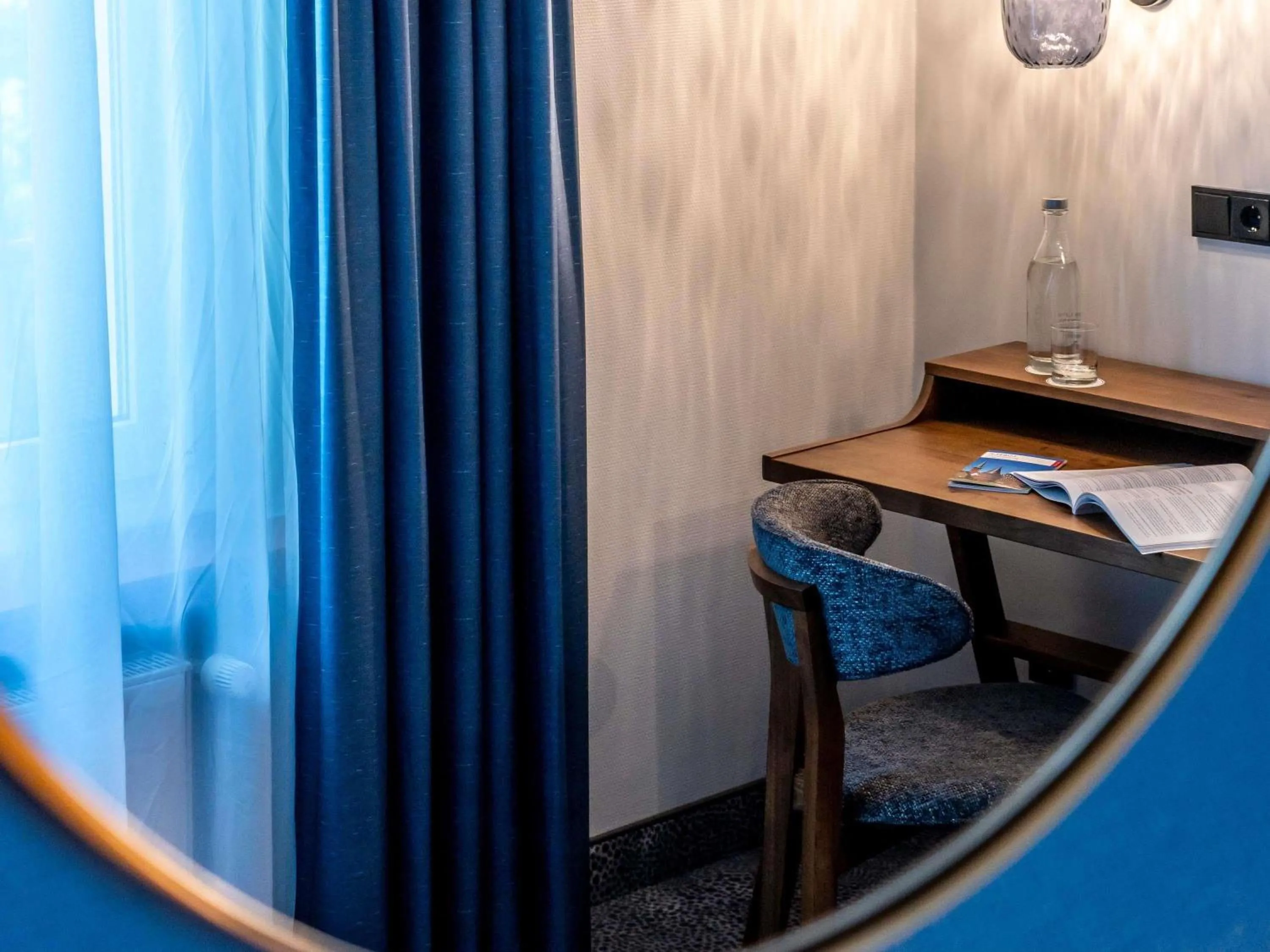 Bedroom in Mercure Hotel Luebeck City Center