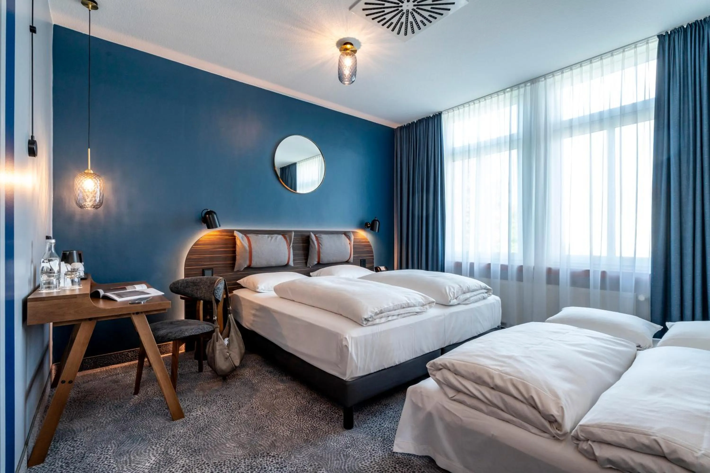 Photo of the whole room, Bed in Mercure Hotel Luebeck City Center