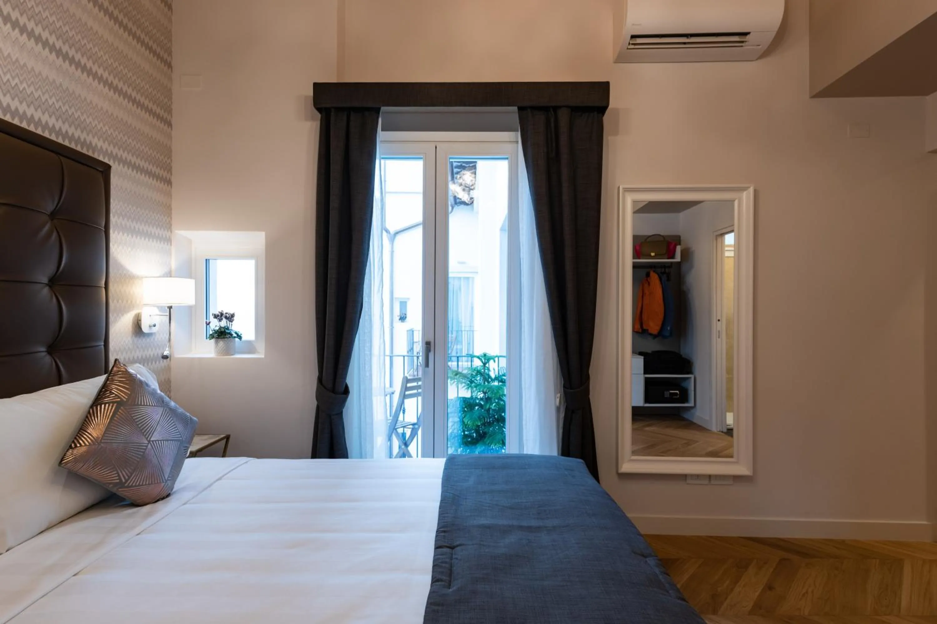 Bed in Kairos by Florence Art Apartments