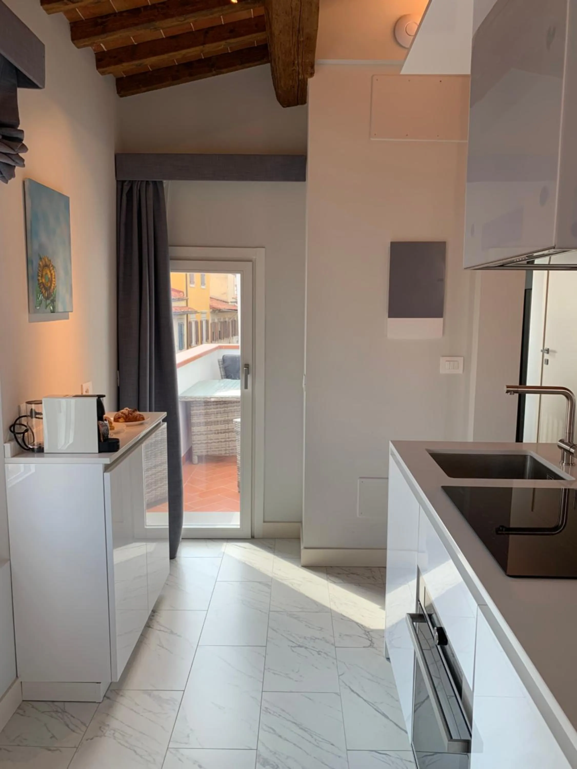 kitchen in Kairos by Florence Art Apartments