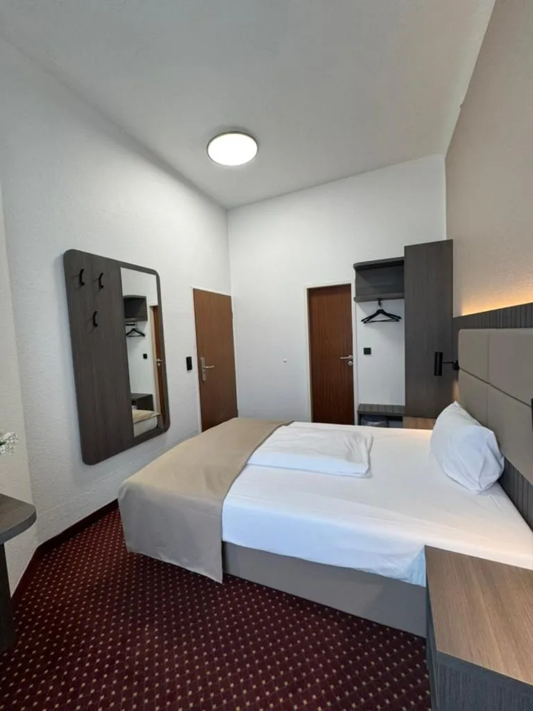 Bed in Hotel Lumen am Hauptbahnhof