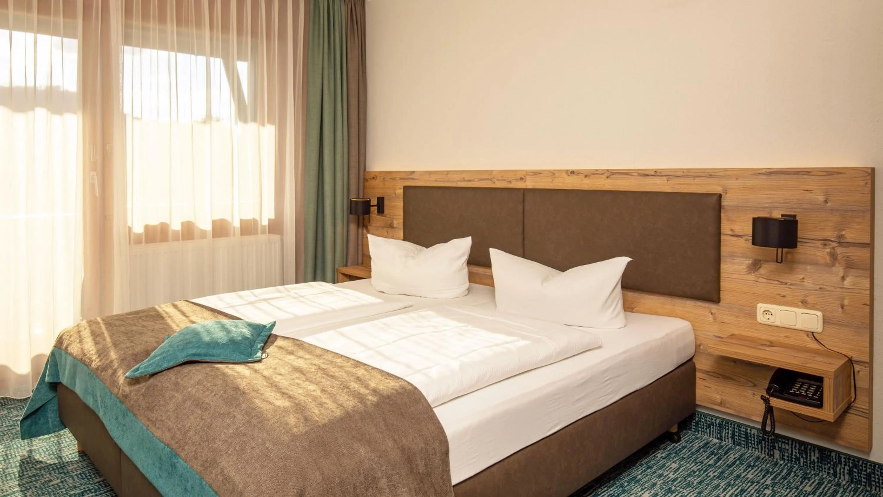 Bed in Das Wiesgauer - Alpenhotel Inzell