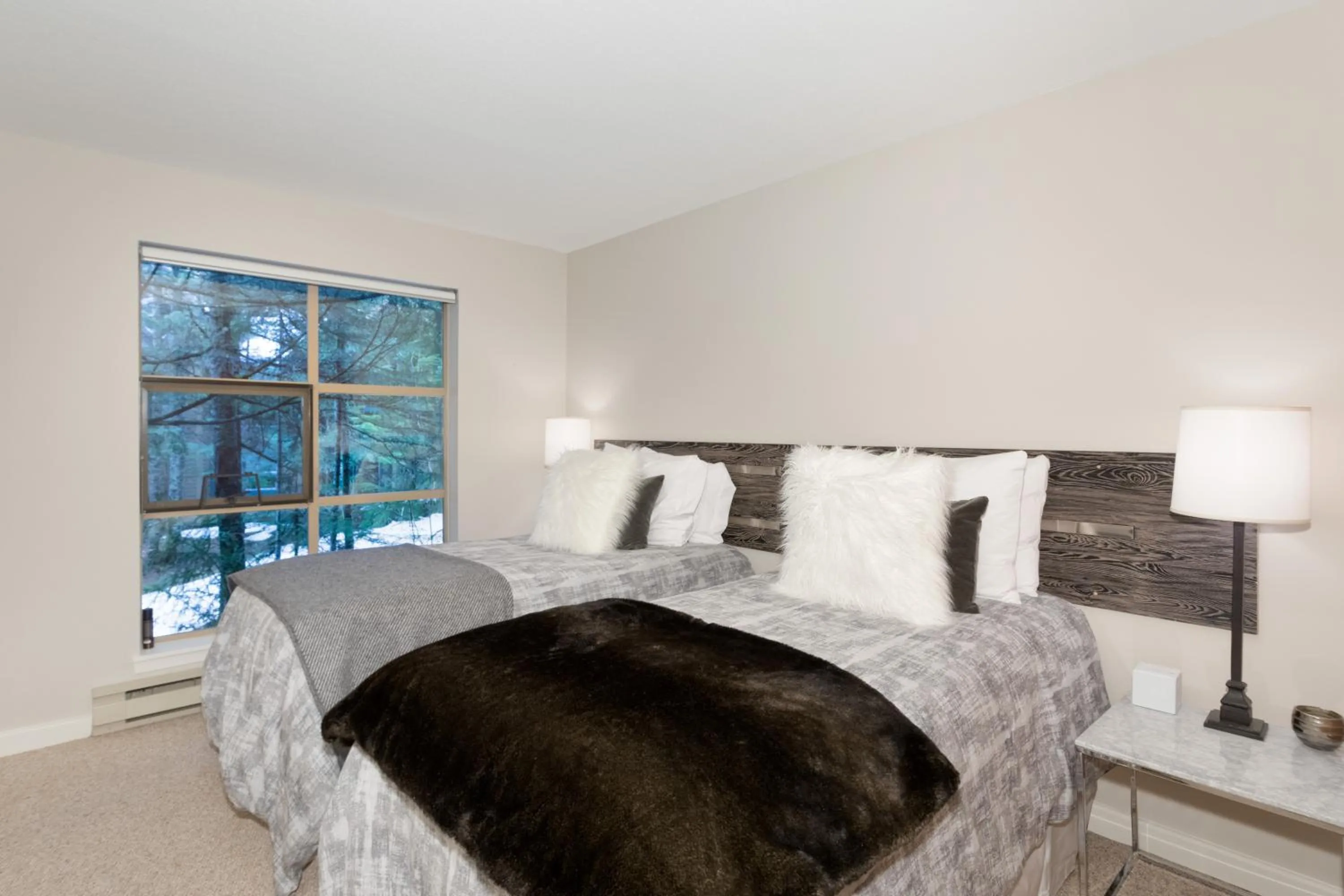 Bed in Forest Trails by Whistler Premier