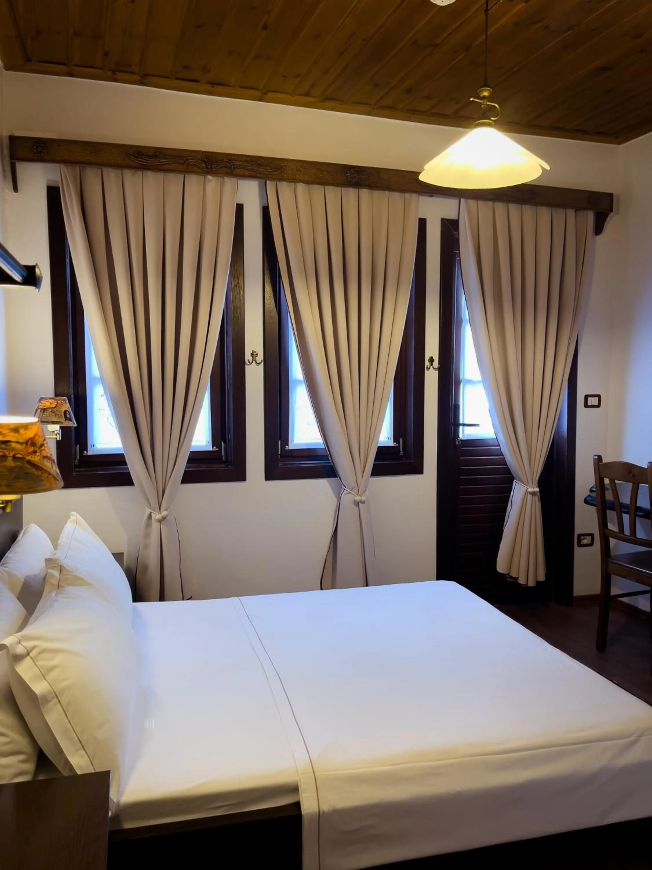 Bed in Hotel Mangalemi